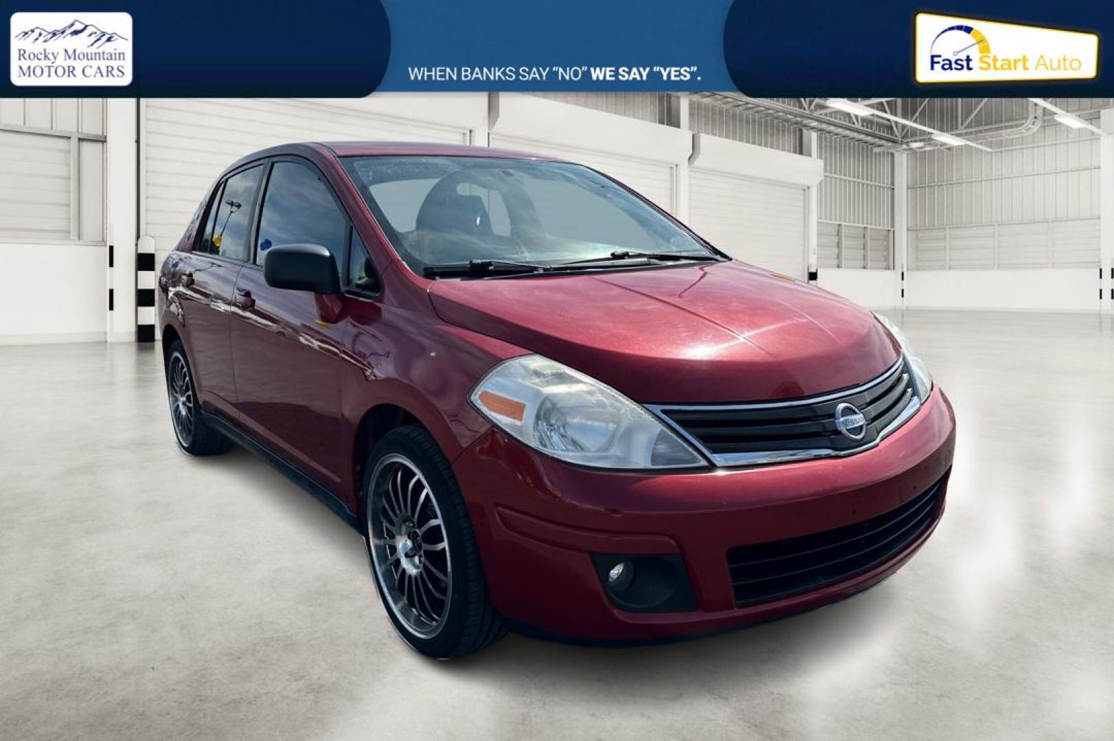 2010 Red Nissan Versa 1.8 S Sedan (3N1BC1AP2AL) with an 1.8L L4 DOHC 16V engine, Automatic, 4-Spd w/Overdrive transmission, located at 7755 State Street, Midvale, UT, 84047, (801) 753-9063, 40.610329, -111.892159 - Photo#0