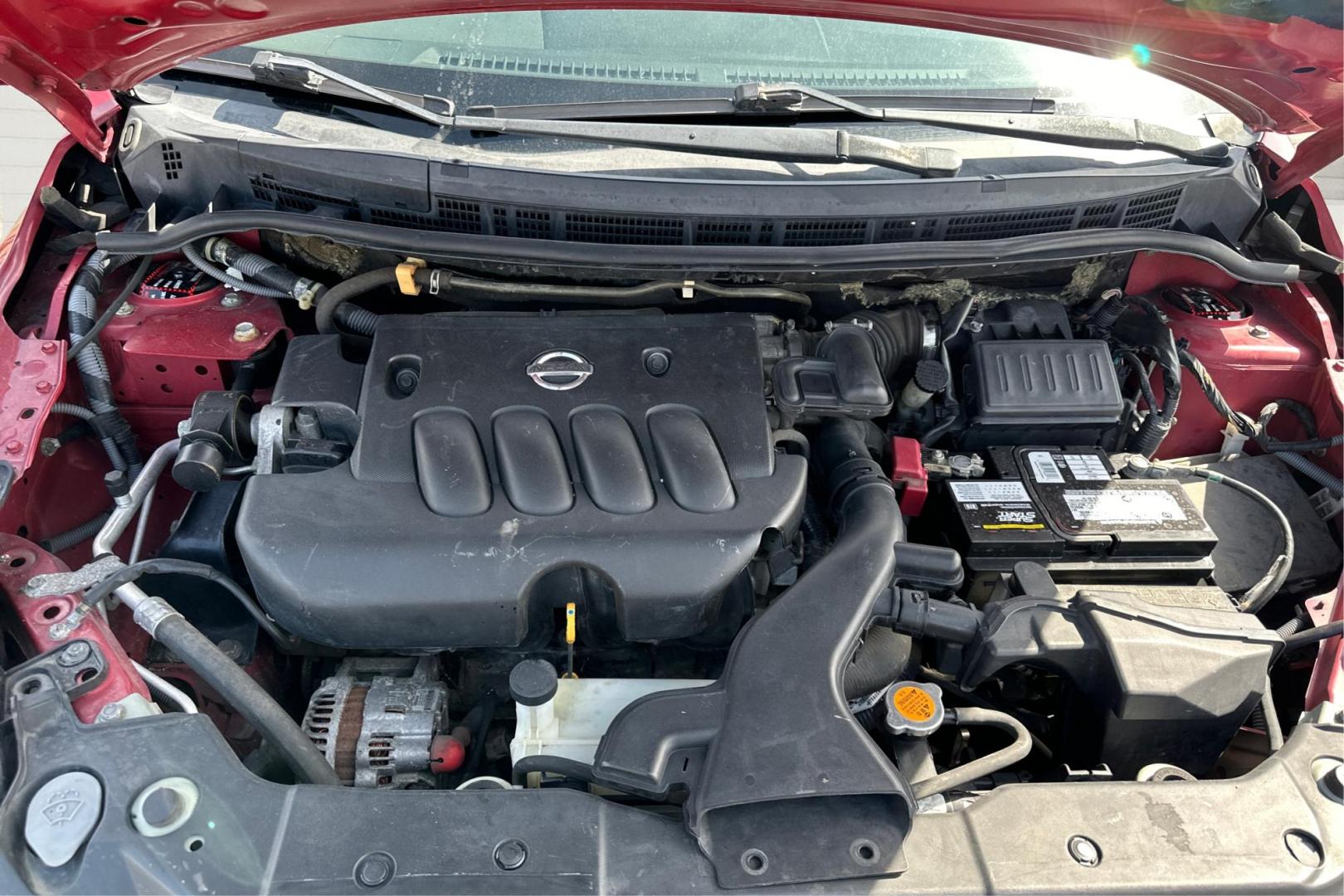 2010 Red Nissan Versa 1.8 S Sedan (3N1BC1AP2AL) with an 1.8L L4 DOHC 16V engine, Automatic, 4-Spd w/Overdrive transmission, located at 7755 State Street, Midvale, UT, 84047, (801) 753-9063, 40.610329, -111.892159 - Photo#10