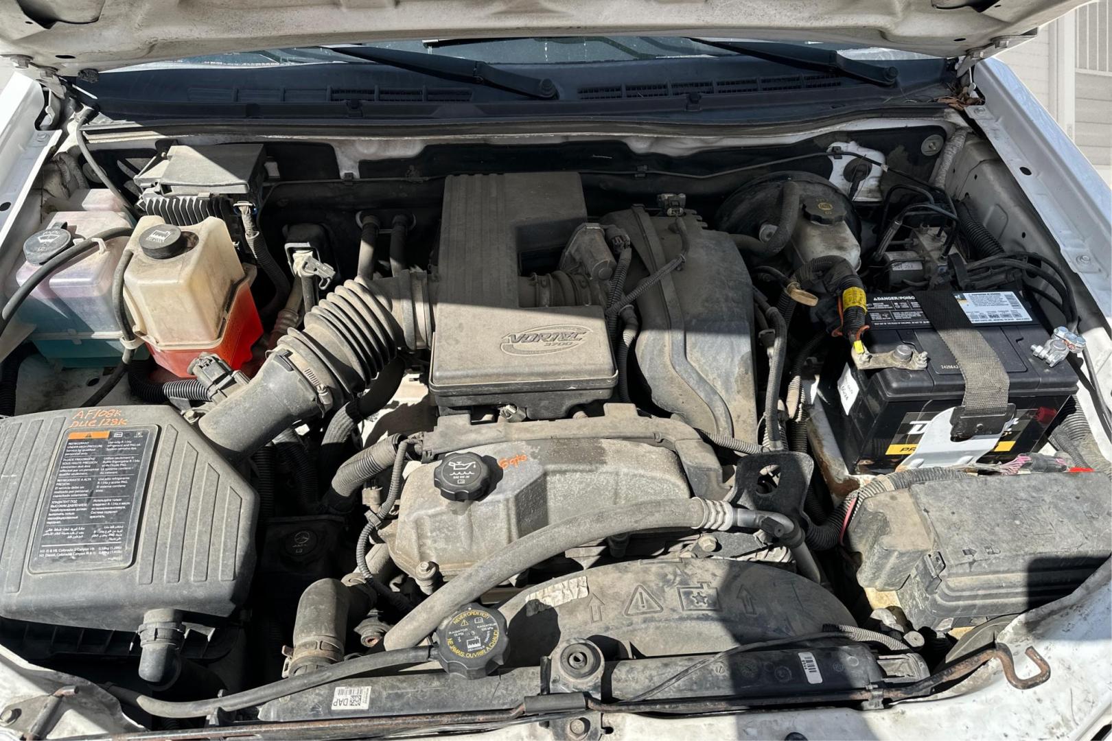 2012 White Chevrolet Colorado Work Truck Ext. Cab 2WD (1GCESBFE9C8) with an 3.7L L5 DOHC 20V engine, Automatic, 4-Spd w/Overdrive transmission, located at 7755 State Street, Midvale, UT, 84047, (801) 753-9063, 40.610329, -111.892159 - Photo#10