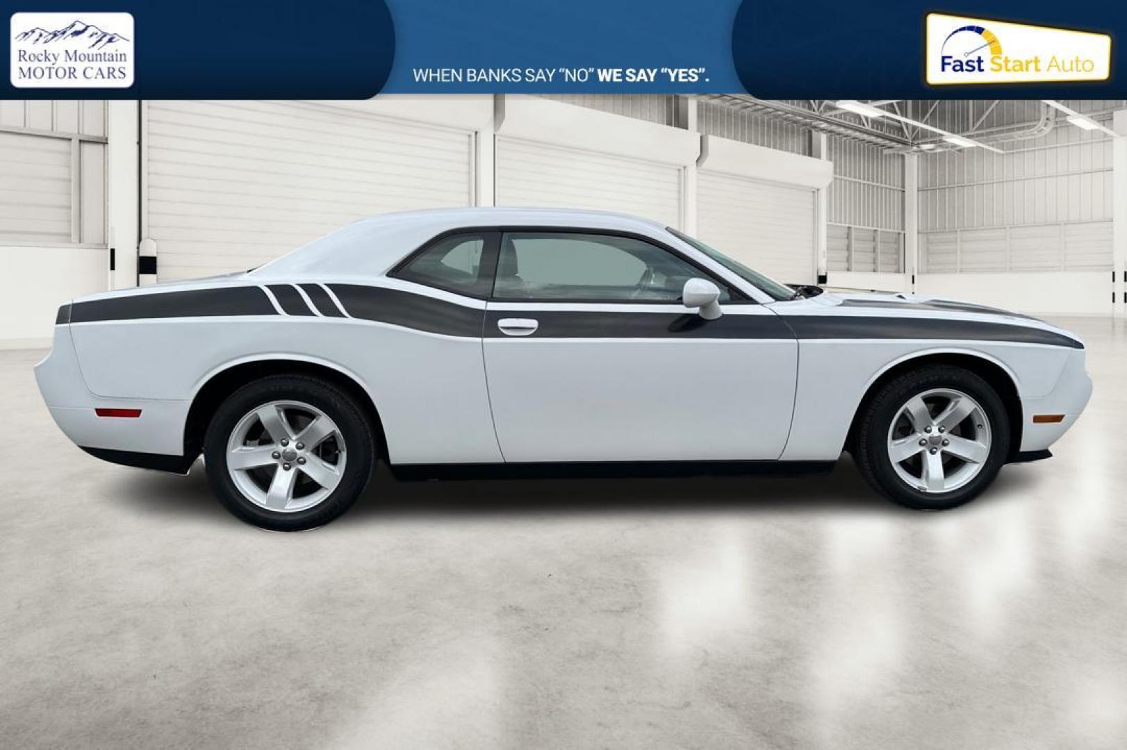 2012 White Dodge Challenger SXT (2C3CDYAG7CH) with an 3.6L V6 DOHC 24V engine, 4-Speed Automatic transmission, located at 7755 State Street, Midvale, UT, 84047, (801) 753-9063, 40.610329, -111.892159 - Photo#1
