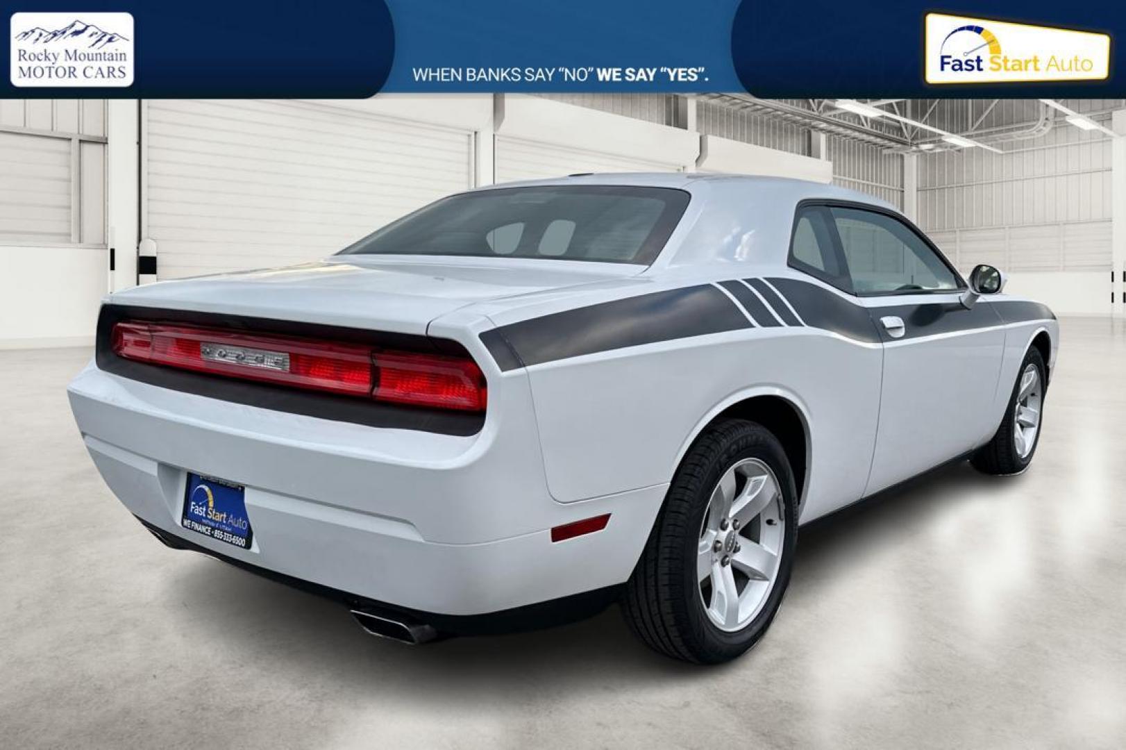 2012 White Dodge Challenger SXT (2C3CDYAG7CH) with an 3.6L V6 DOHC 24V engine, 4-Speed Automatic transmission, located at 7755 State Street, Midvale, UT, 84047, (801) 753-9063, 40.610329, -111.892159 - Photo#2