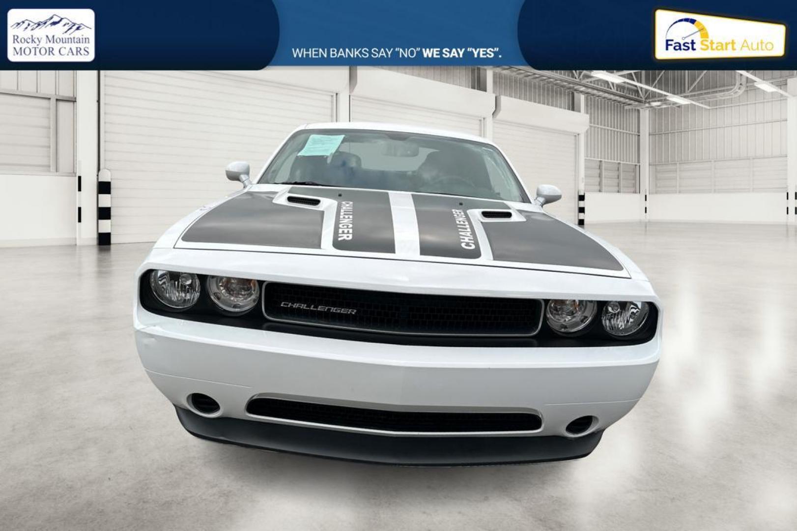 2012 White Dodge Challenger SXT (2C3CDYAG7CH) with an 3.6L V6 DOHC 24V engine, 4-Speed Automatic transmission, located at 7755 State Street, Midvale, UT, 84047, (801) 753-9063, 40.610329, -111.892159 - Photo#9