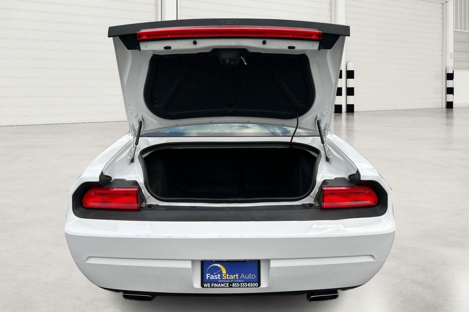 2012 White Dodge Challenger SXT (2C3CDYAG7CH) with an 3.6L V6 DOHC 24V engine, 4-Speed Automatic transmission, located at 7755 State Street, Midvale, UT, 84047, (801) 753-9063, 40.610329, -111.892159 - Photo#13