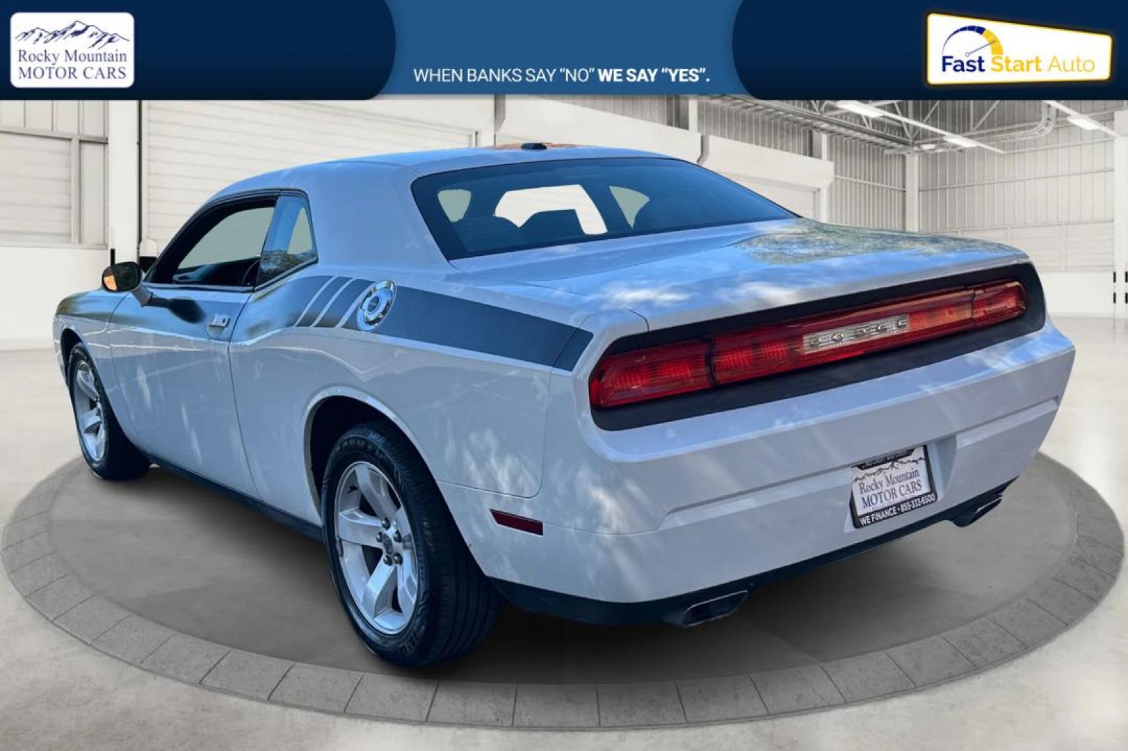 2012 White Dodge Challenger SXT (2C3CDYAG7CH) with an 3.6L V6 DOHC 24V engine, 4-Speed Automatic transmission, located at 767 S State Road, Pleasant Grove, UT, 84062, (801) 785-1058, 40.354839, -111.736687 - Photo#4