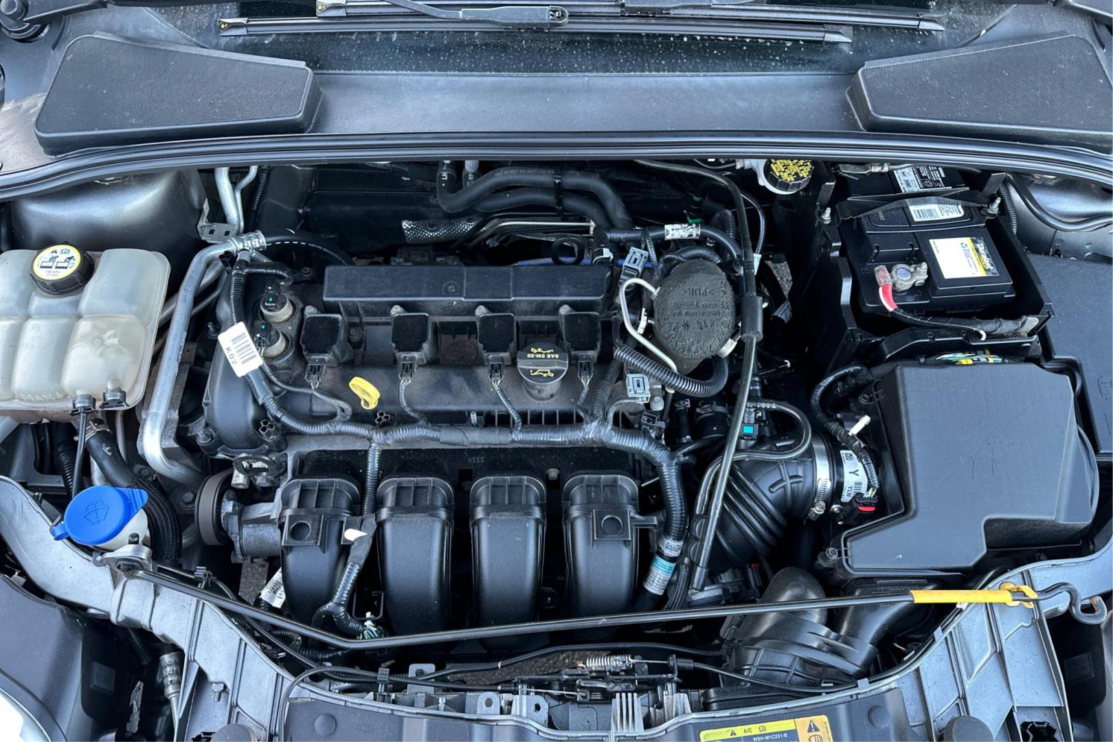 2012 Gray Ford Focus SEL (1FAHP3M24CL) with an 2.0L L4 DOHC 16V engine, 6-Speed Automatic transmission, located at 767 S State Road, Pleasant Grove, UT, 84062, (801) 785-1058, 40.354839, -111.736687 - Photo#10