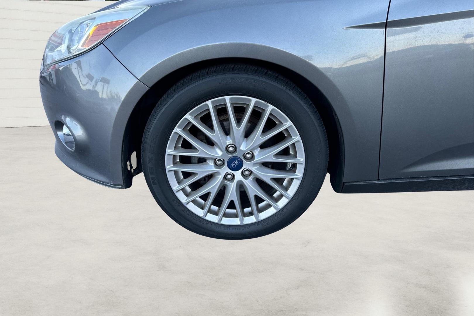 2012 Gray Ford Focus SEL (1FAHP3M24CL) with an 2.0L L4 DOHC 16V engine, 6-Speed Automatic transmission, located at 767 S State Road, Pleasant Grove, UT, 84062, (801) 785-1058, 40.354839, -111.736687 - Photo#12