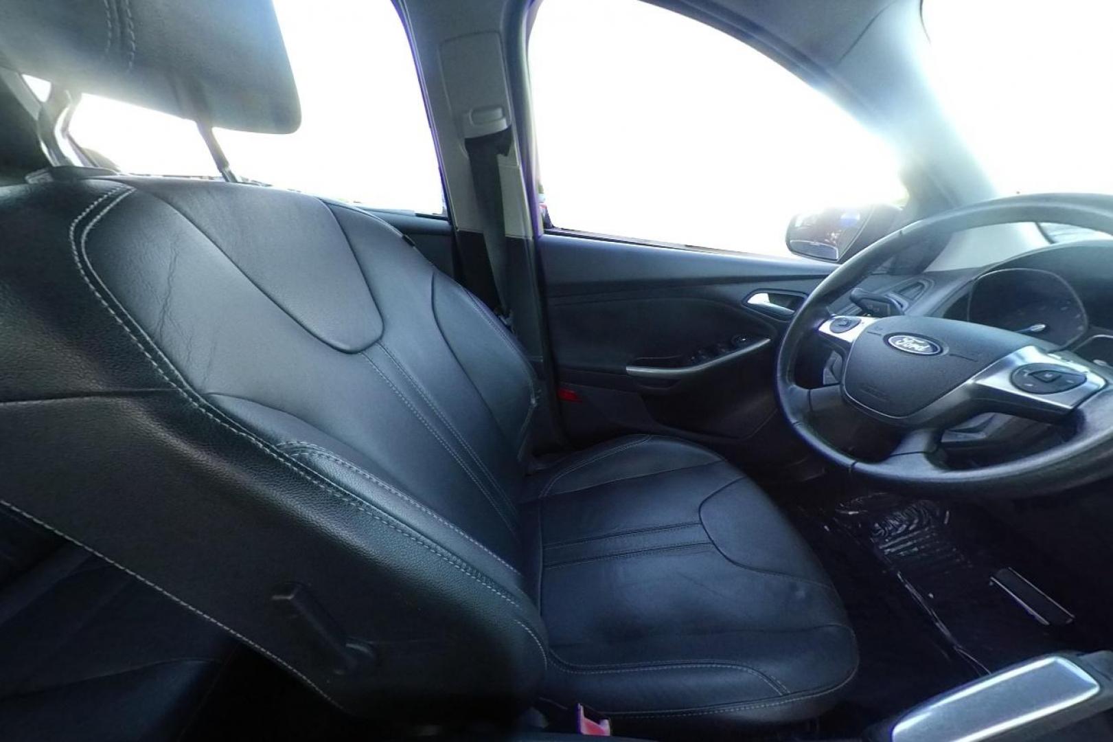 2012 Gray Ford Focus SEL (1FAHP3M24CL) with an 2.0L L4 DOHC 16V engine, 6-Speed Automatic transmission, located at 767 S State Road, Pleasant Grove, UT, 84062, (801) 785-1058, 40.354839, -111.736687 - Photo#17