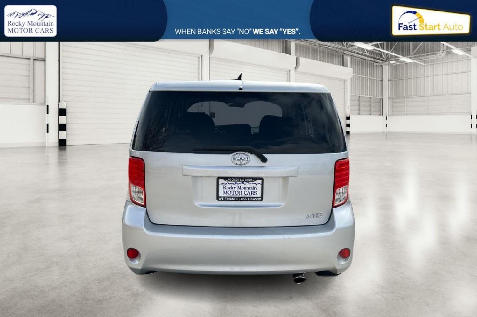 2012 Silver Scion xB 5-Door Wagon 5-Spd MT (JTLZE4FE4C1) with an 2.4L L4 DOHC 16V engine, 5-Speed Manual transmission, located at 344 S Washington Blvd, Ogden, UT, 84404, (801) 399-1799, 41.255482, -111.970848 - Photo#4