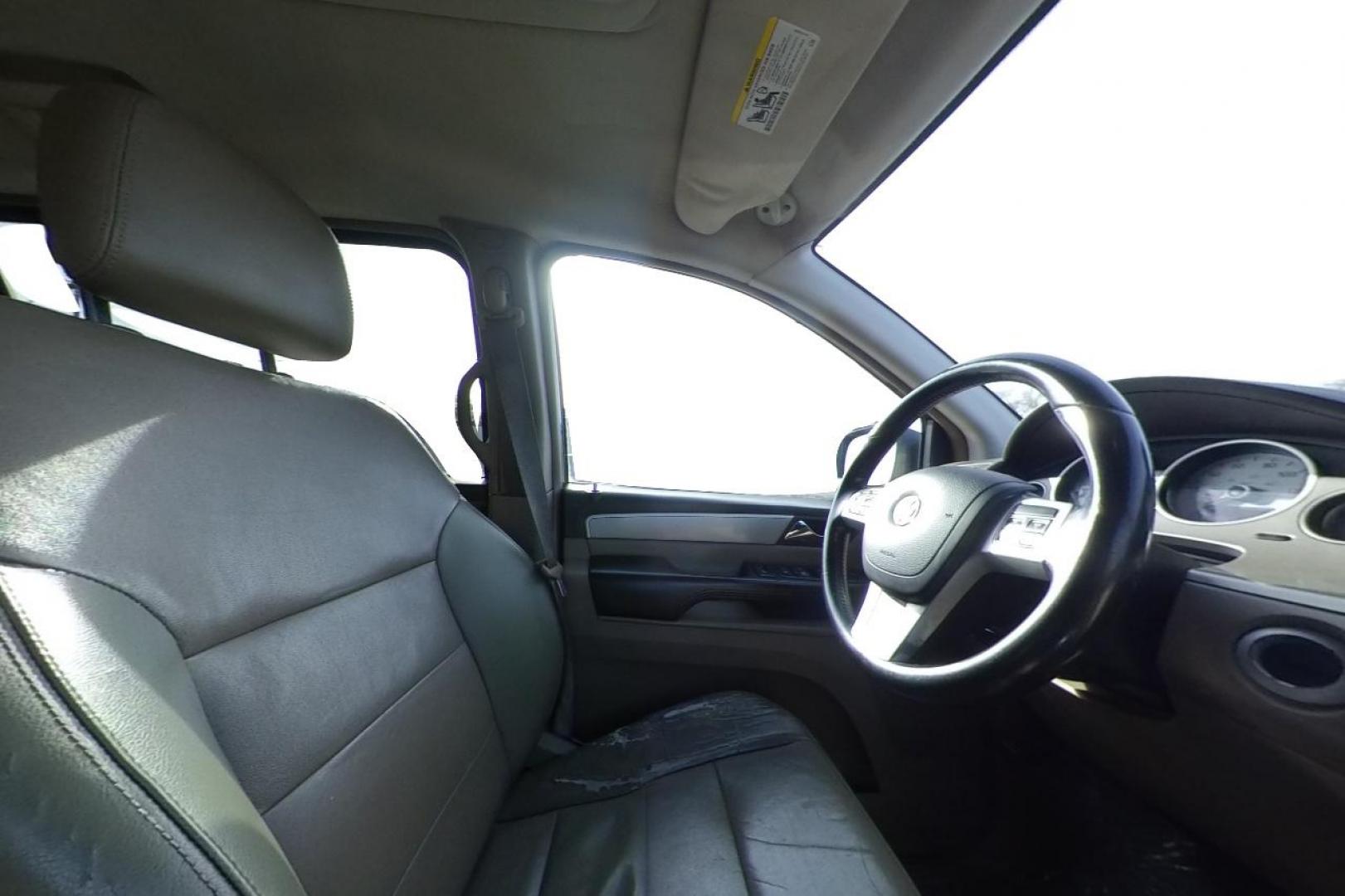 2012 Gray Volkswagen Routan SEL (2C4RVACG7CR) with an 3.6L V6 DOHC 24V engine, 6-Speed Automatic transmission, located at 7755 State Street, Midvale, UT, 84047, (801) 753-9063, 40.610329, -111.892159 - Photo#17