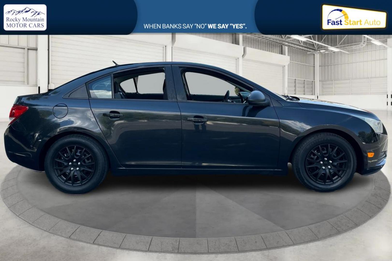2013 Black Chevrolet Cruze LS Manual (1G1PB5SH3D7) with an 1.8L L4 DOHC 16V FFV engine, 6-Speed Manual transmission, located at 767 S State Road, Pleasant Grove, UT, 84062, (801) 785-1058, 40.354839, -111.736687 - Photo#1
