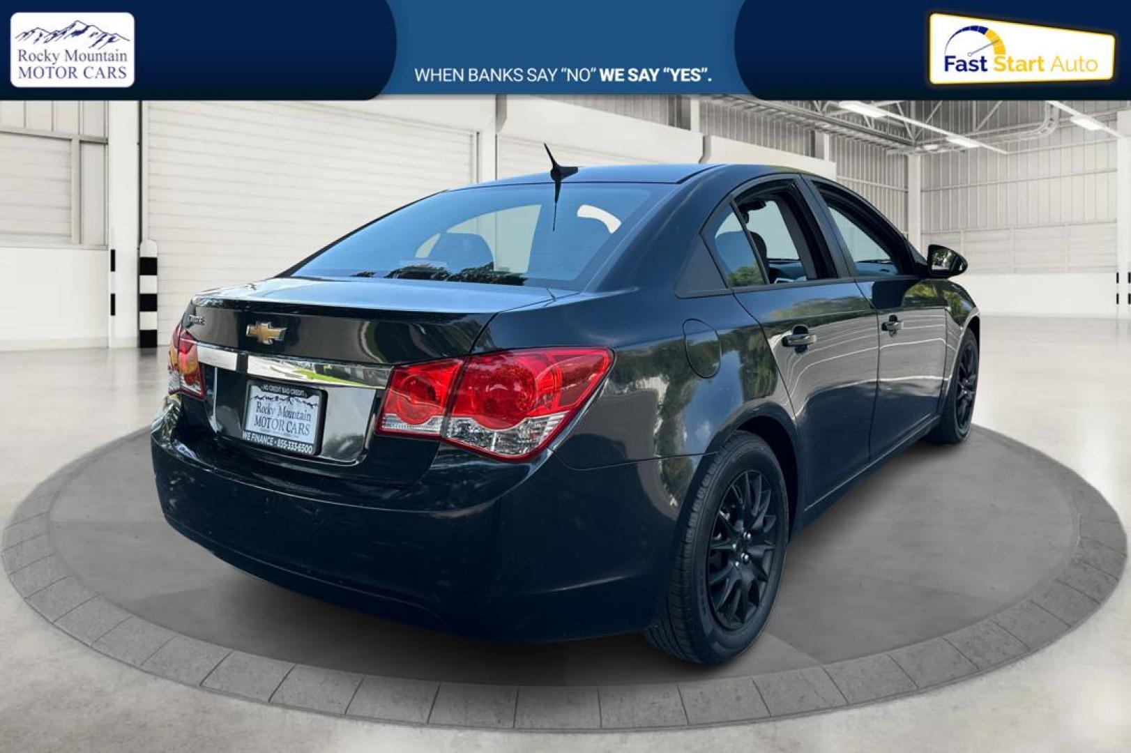 2013 Black Chevrolet Cruze LS Manual (1G1PB5SH3D7) with an 1.8L L4 DOHC 16V FFV engine, 6-Speed Manual transmission, located at 767 S State Road, Pleasant Grove, UT, 84062, (801) 785-1058, 40.354839, -111.736687 - Photo#2