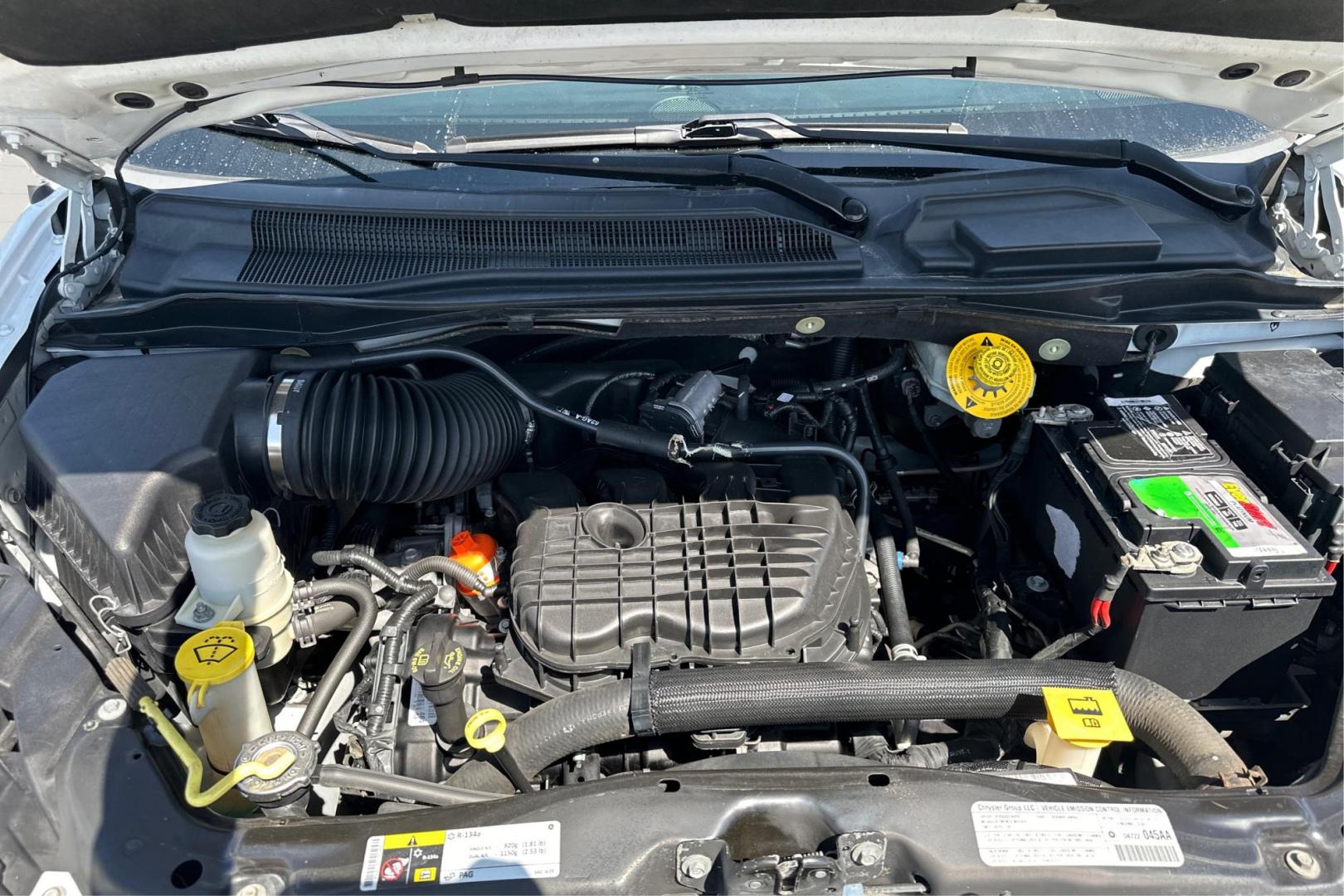 2013 White Chrysler Town and Country Touring (2C4RC1BG4DR) with an 3.6L V6 DOHC 24V engine, 6-Speed Automatic transmission, located at 7755 State Street, Midvale, UT, 84047, (801) 753-9063, 40.610329, -111.892159 - Photo#10