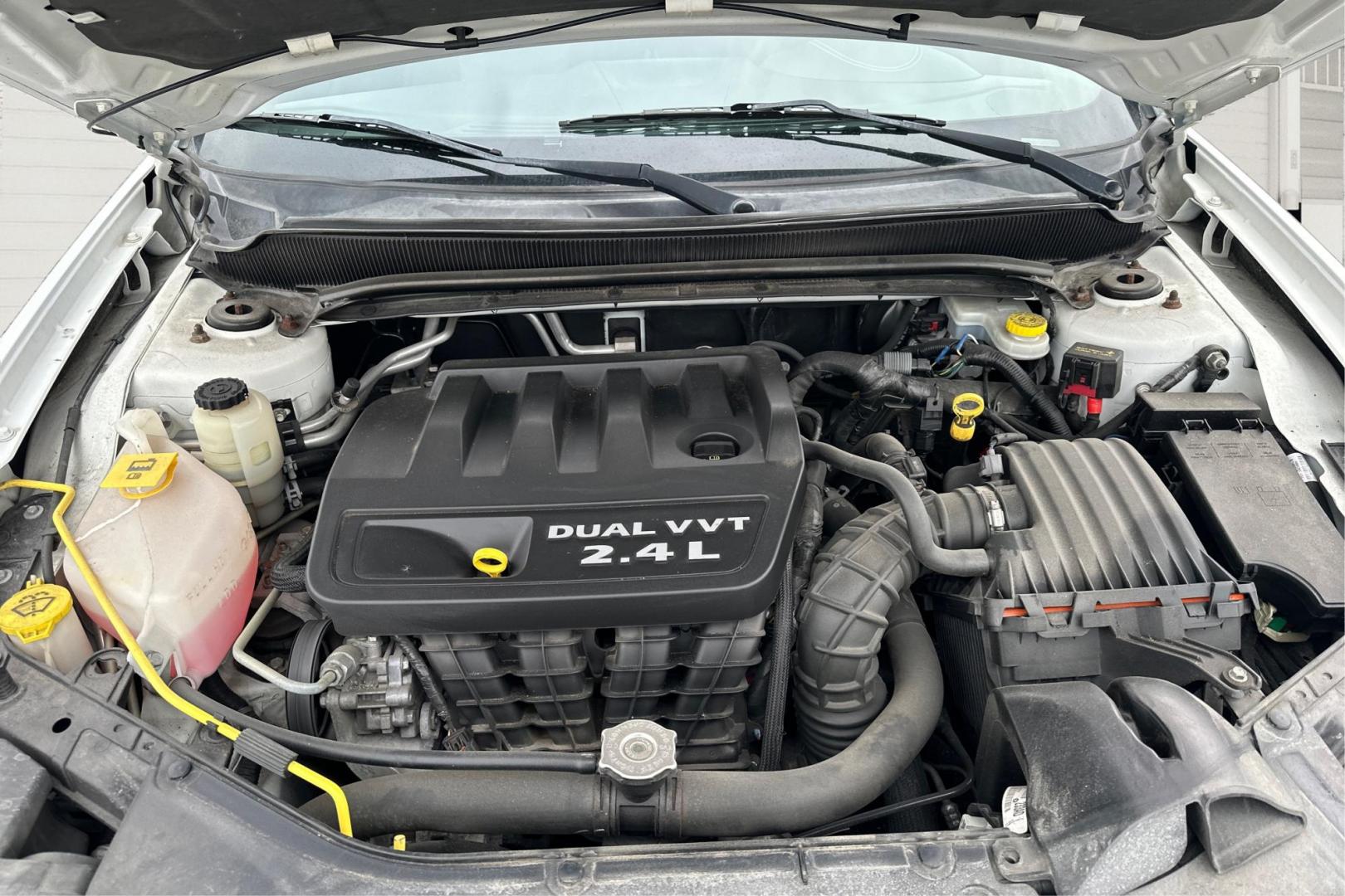 2013 White Dodge Avenger Base (1C3CDZAB7DN) with an 2.4L L4 DOHC 16V engine, 4-Speed Automatic transmission, located at 767 S State Road, Pleasant Grove, UT, 84062, (801) 785-1058, 40.354839, -111.736687 - Photo#8