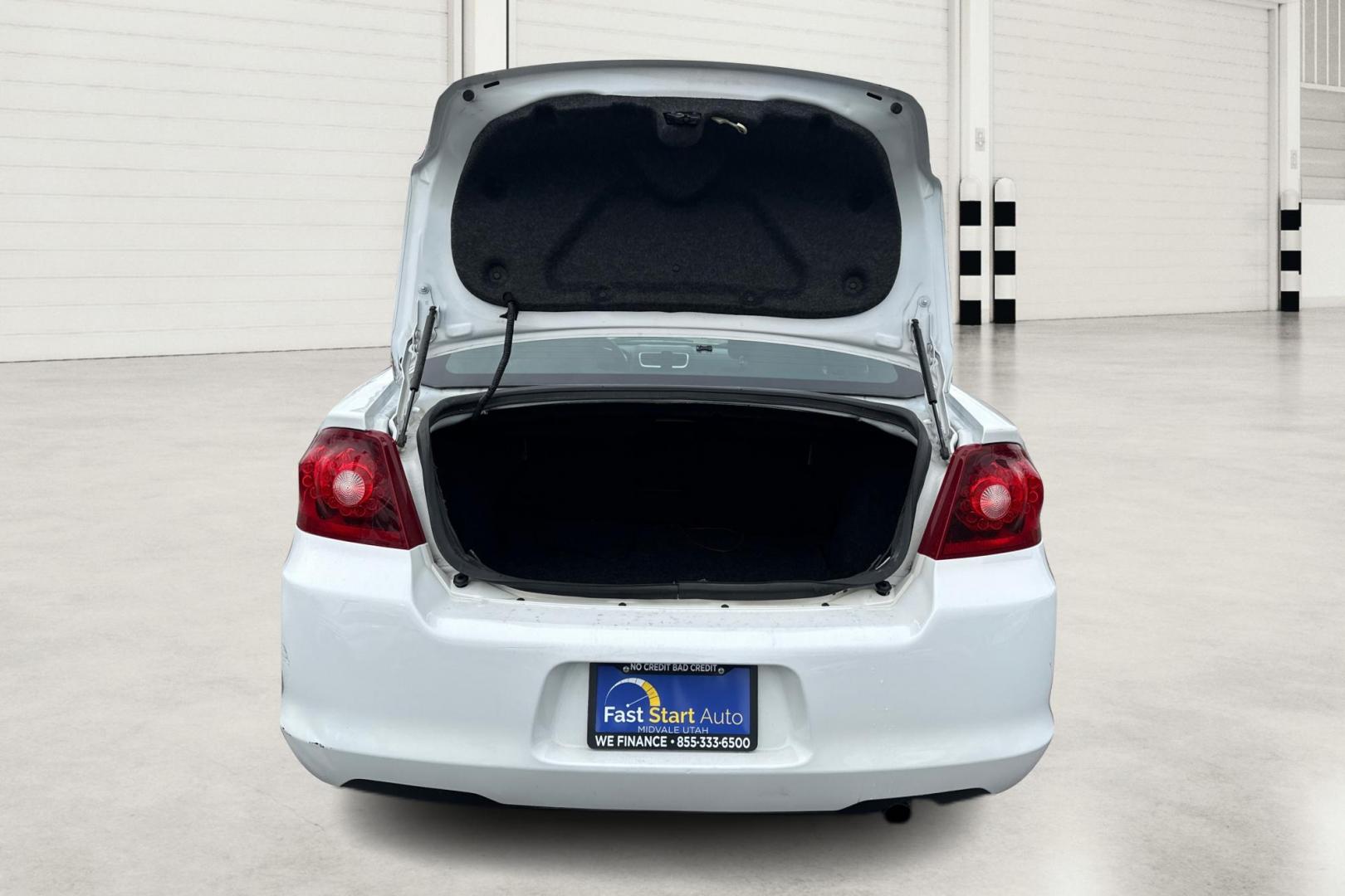 2013 White Dodge Avenger Base (1C3CDZAB7DN) with an 2.4L L4 DOHC 16V engine, 4-Speed Automatic transmission, located at 767 S State Road, Pleasant Grove, UT, 84062, (801) 785-1058, 40.354839, -111.736687 - Photo#10