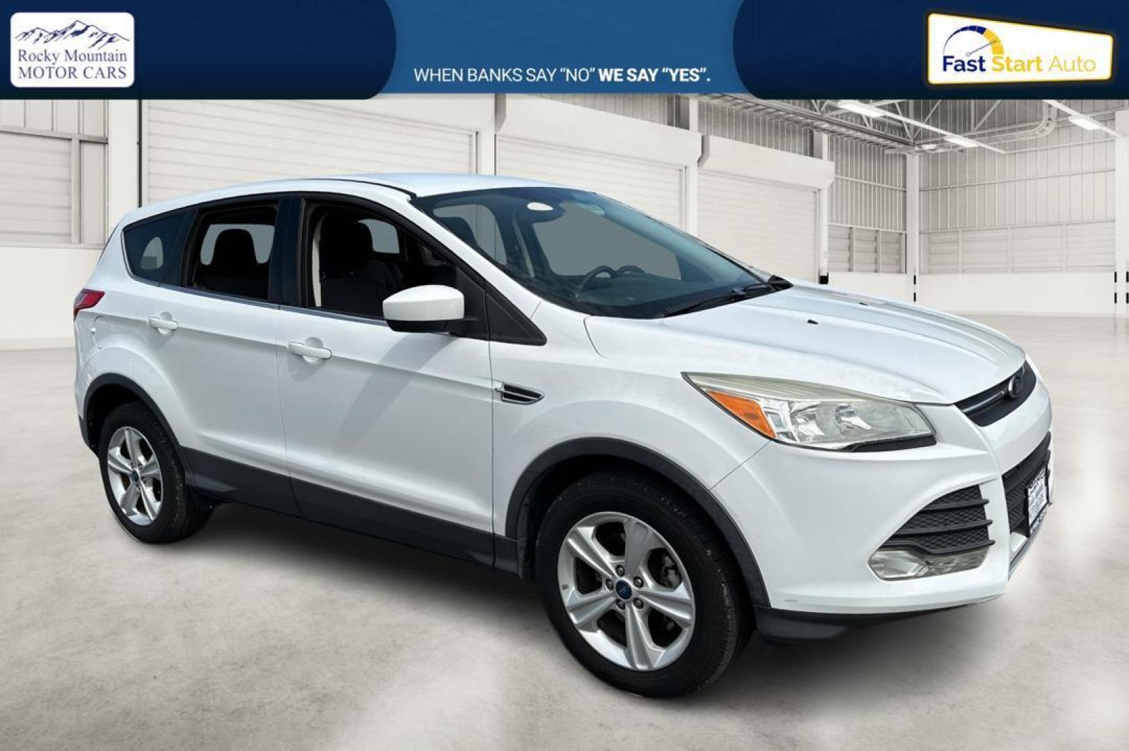 2013 White Ford Escape SE FWD (1FMCU0GX0DU) with an 1.6L L4 DOHC 16V engine, 6-Speed Automatic transmission, located at 7755 State Street, Midvale, UT, 84047, (801) 753-9063, 40.610329, -111.892159 - Photo#0