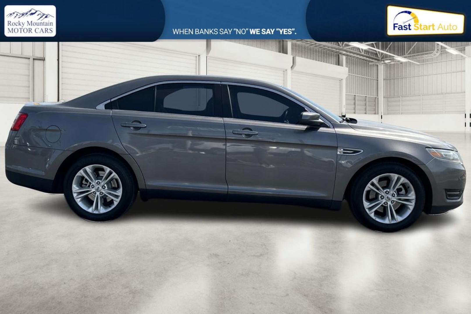 2013 Gray Ford Taurus SEL FWD (1FAHP2E87DG) with an 3.5L V6 DOHC 24V engine, 6-Speed Automatic transmission, located at 7755 State Street, Midvale, UT, 84047, (801) 753-9063, 40.610329, -111.892159 - Photo#1