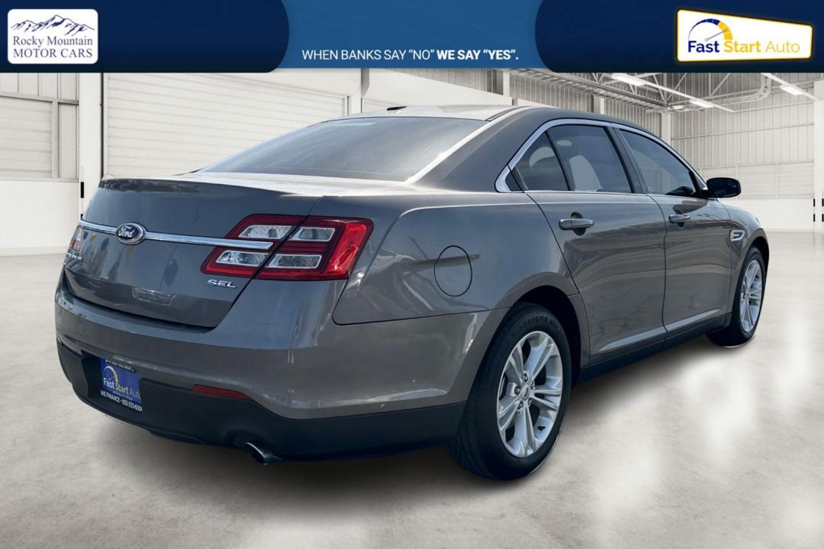 2013 Gray Ford Taurus SEL FWD (1FAHP2E87DG) with an 3.5L V6 DOHC 24V engine, 6-Speed Automatic transmission, located at 7755 State Street, Midvale, UT, 84047, (801) 753-9063, 40.610329, -111.892159 - Photo#2