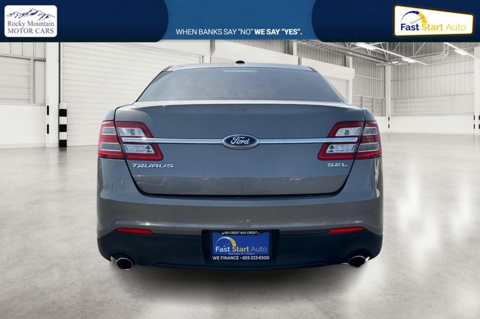 2013 Gray Ford Taurus SEL FWD (1FAHP2E87DG) with an 3.5L V6 DOHC 24V engine, 6-Speed Automatic transmission, located at 7755 State Street, Midvale, UT, 84047, (801) 753-9063, 40.610329, -111.892159 - Photo#4