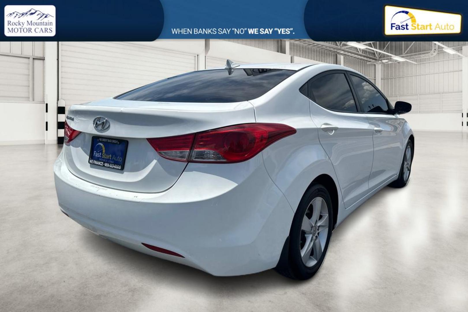 2013 White Hyundai Elantra Limited (5NPDH4AE7DH) with an 1.8L L4 DOHC 16V engine, 6-Speed Automatic transmission, located at 767 S State Road, Pleasant Grove, UT, 84062, (801) 785-1058, 40.354839, -111.736687 - Photo#2
