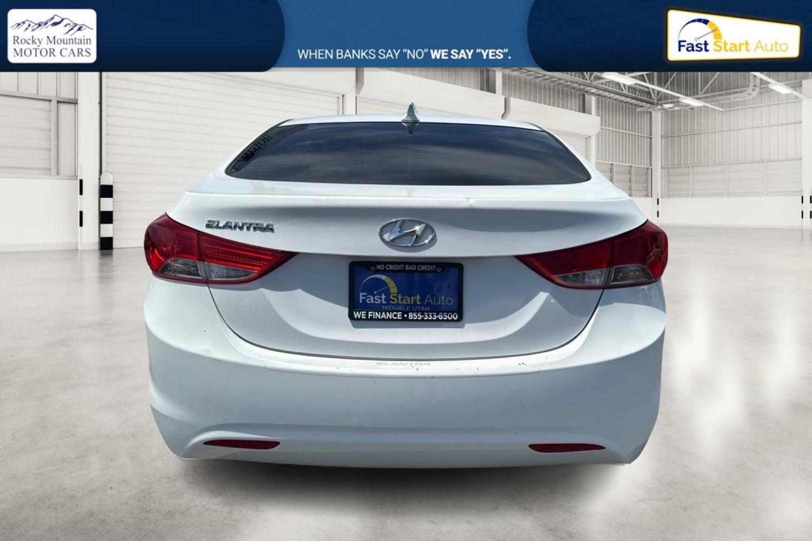 2013 White Hyundai Elantra Limited (5NPDH4AE7DH) with an 1.8L L4 DOHC 16V engine, 6-Speed Automatic transmission, located at 767 S State Road, Pleasant Grove, UT, 84062, (801) 785-1058, 40.354839, -111.736687 - Photo#4