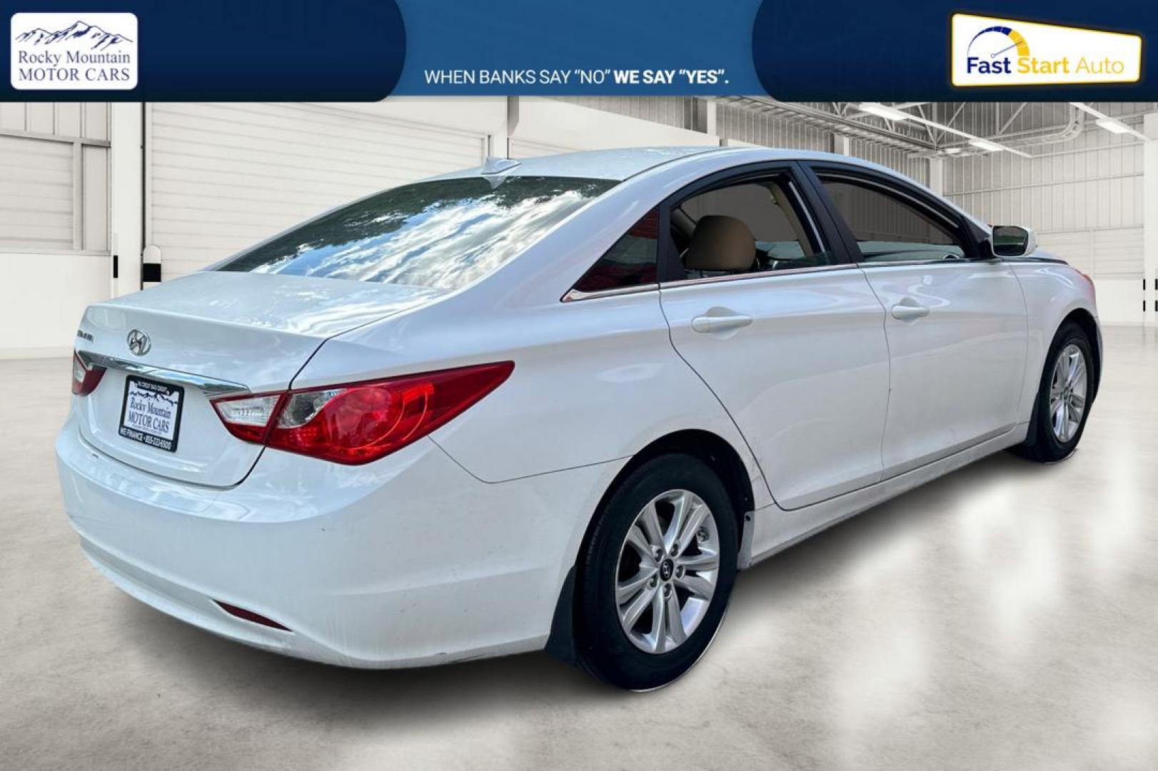 2013 White Hyundai Sonata GLS (5NPEB4AC4DH) with an 2.4L L4 DOHC 16V engine, 6-Speed Automatic transmission, located at 7755 State Street, Midvale, UT, 84047, (801) 753-9063, 40.610329, -111.892159 - Photo#2