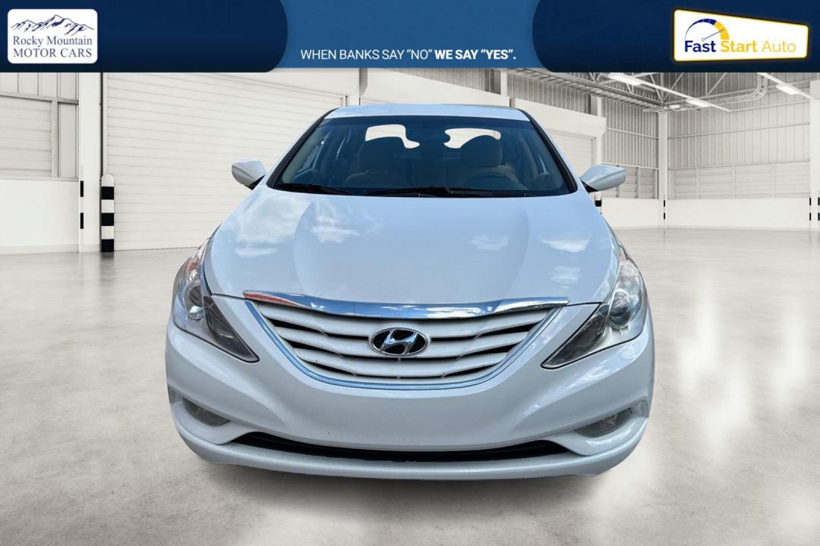 2013 White Hyundai Sonata GLS (5NPEB4AC4DH) with an 2.4L L4 DOHC 16V engine, 6-Speed Automatic transmission, located at 7755 State Street, Midvale, UT, 84047, (801) 753-9063, 40.610329, -111.892159 - Photo#9