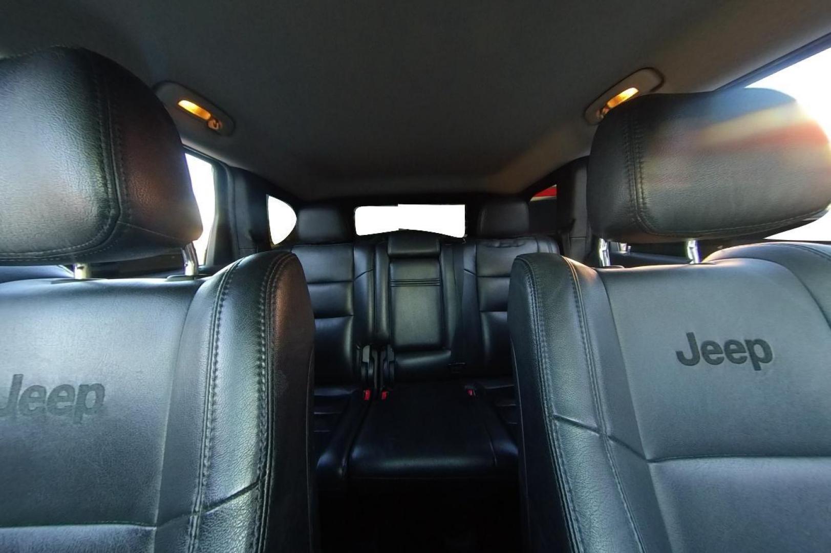 2013 White Jeep Grand Cherokee Laredo 2WD (1C4RJEAG6DC) with an 3.6L V6 DOHC 24V engine, 5-Speed Automatic transmission, located at 7755 State Street, Midvale, UT, 84047, (801) 753-9063, 40.610329, -111.892159 - Photo#16