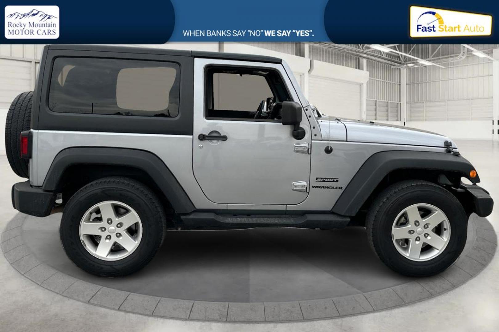 2013 Silver Jeep Wrangler Sport 4WD (1C4GJWAG0DL) with an 3.6L V6 DOHC 24V FFV engine, Automatic, 5-Spd transmission, located at 767 S State Road, Pleasant Grove, UT, 84062, (801) 785-1058, 40.354839, -111.736687 - Photo#1