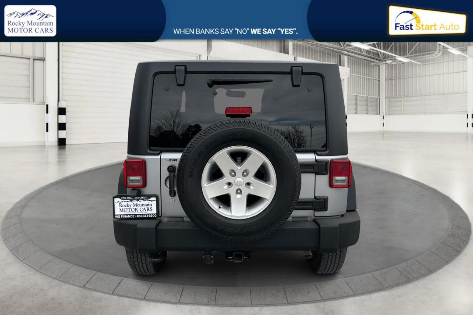 2013 Silver Jeep Wrangler Sport 4WD (1C4GJWAG0DL) with an 3.6L V6 DOHC 24V FFV engine, Automatic, 5-Spd transmission, located at 767 S State Road, Pleasant Grove, UT, 84062, (801) 785-1058, 40.354839, -111.736687 - Photo#3