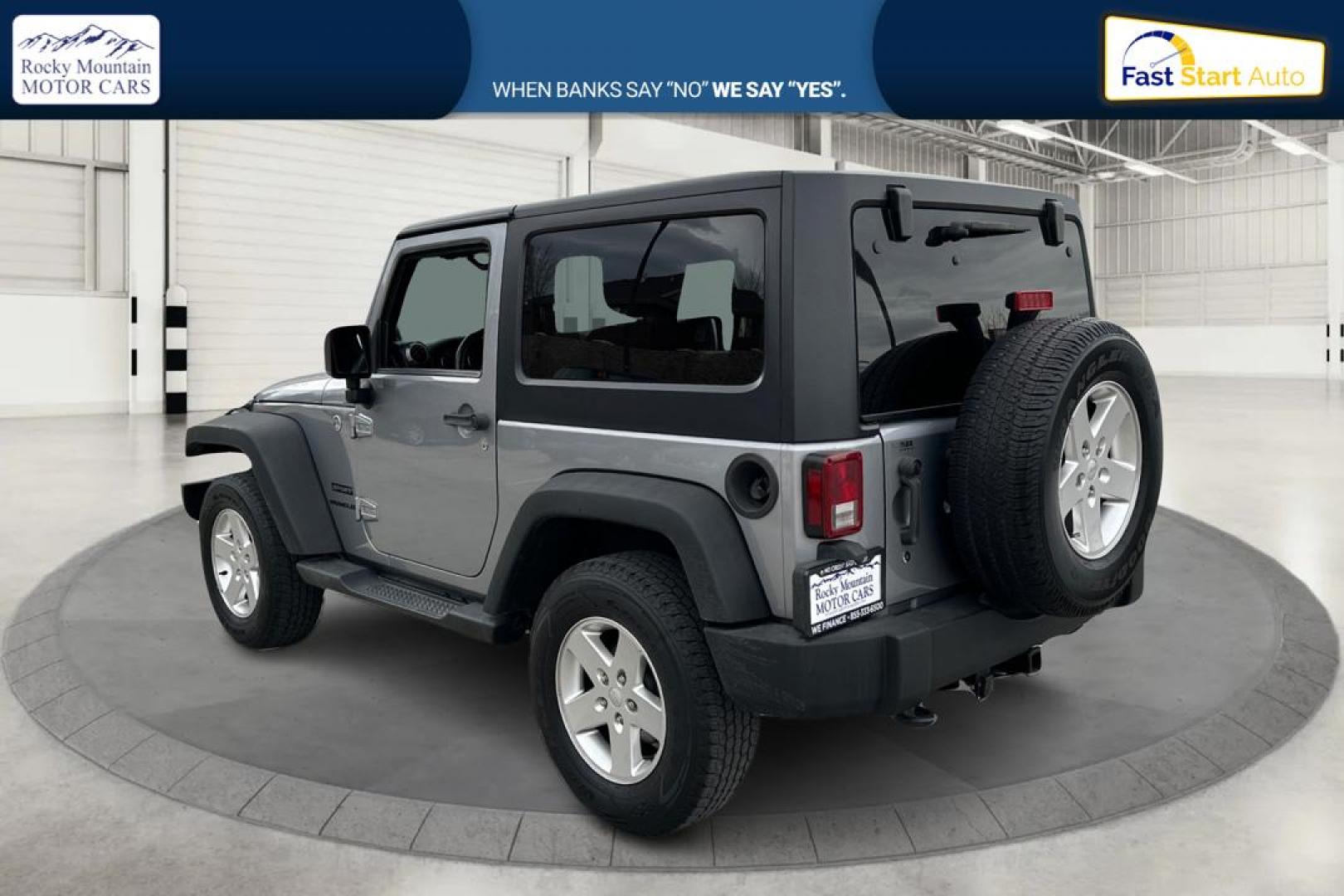2013 Silver Jeep Wrangler Sport 4WD (1C4GJWAG0DL) with an 3.6L V6 DOHC 24V FFV engine, Automatic, 5-Spd transmission, located at 767 S State Road, Pleasant Grove, UT, 84062, (801) 785-1058, 40.354839, -111.736687 - Photo#4