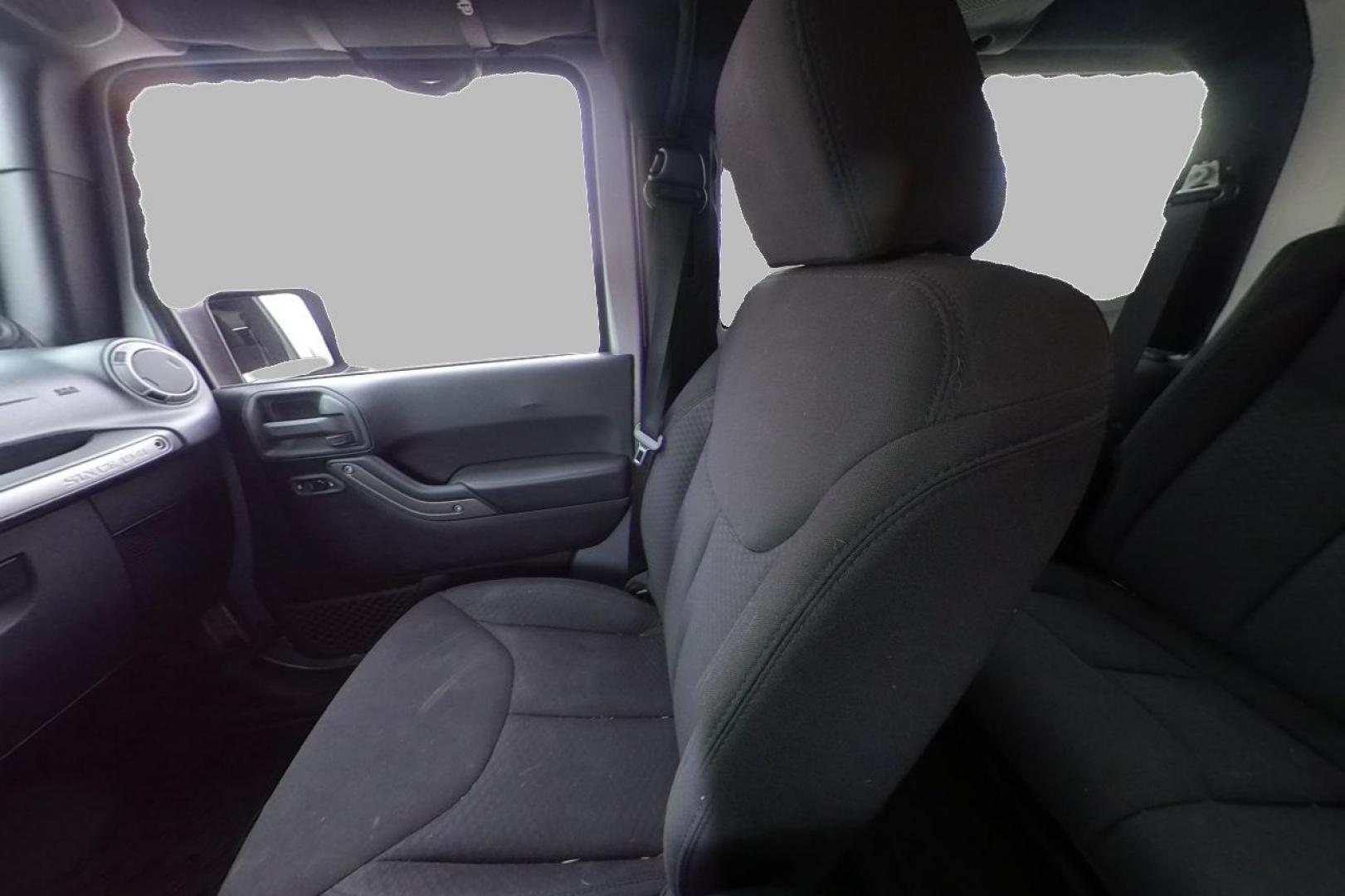 2013 Silver Jeep Wrangler Sport 4WD (1C4GJWAG0DL) with an 3.6L V6 DOHC 24V FFV engine, Automatic, 5-Spd transmission, located at 767 S State Road, Pleasant Grove, UT, 84062, (801) 785-1058, 40.354839, -111.736687 - Photo#16