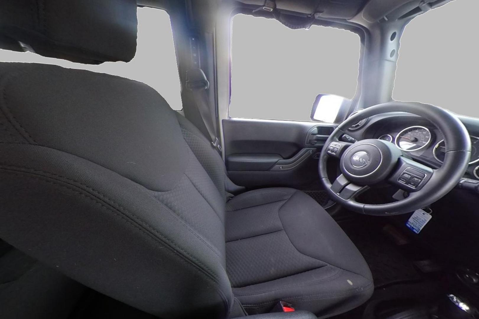 2013 Silver Jeep Wrangler Sport 4WD (1C4GJWAG0DL) with an 3.6L V6 DOHC 24V FFV engine, Automatic, 5-Spd transmission, located at 767 S State Road, Pleasant Grove, UT, 84062, (801) 785-1058, 40.354839, -111.736687 - Photo#18