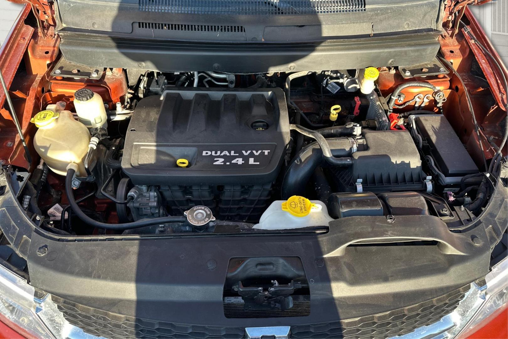 2014 Orange Dodge Journey SE (3C4PDCAB7ET) with an 2.4L L4 DOHC 16V engine, 4-Speed Automatic transmission, located at 7755 State Street, Midvale, UT, 84047, (801) 753-9063, 40.610329, -111.892159 - Photo#8