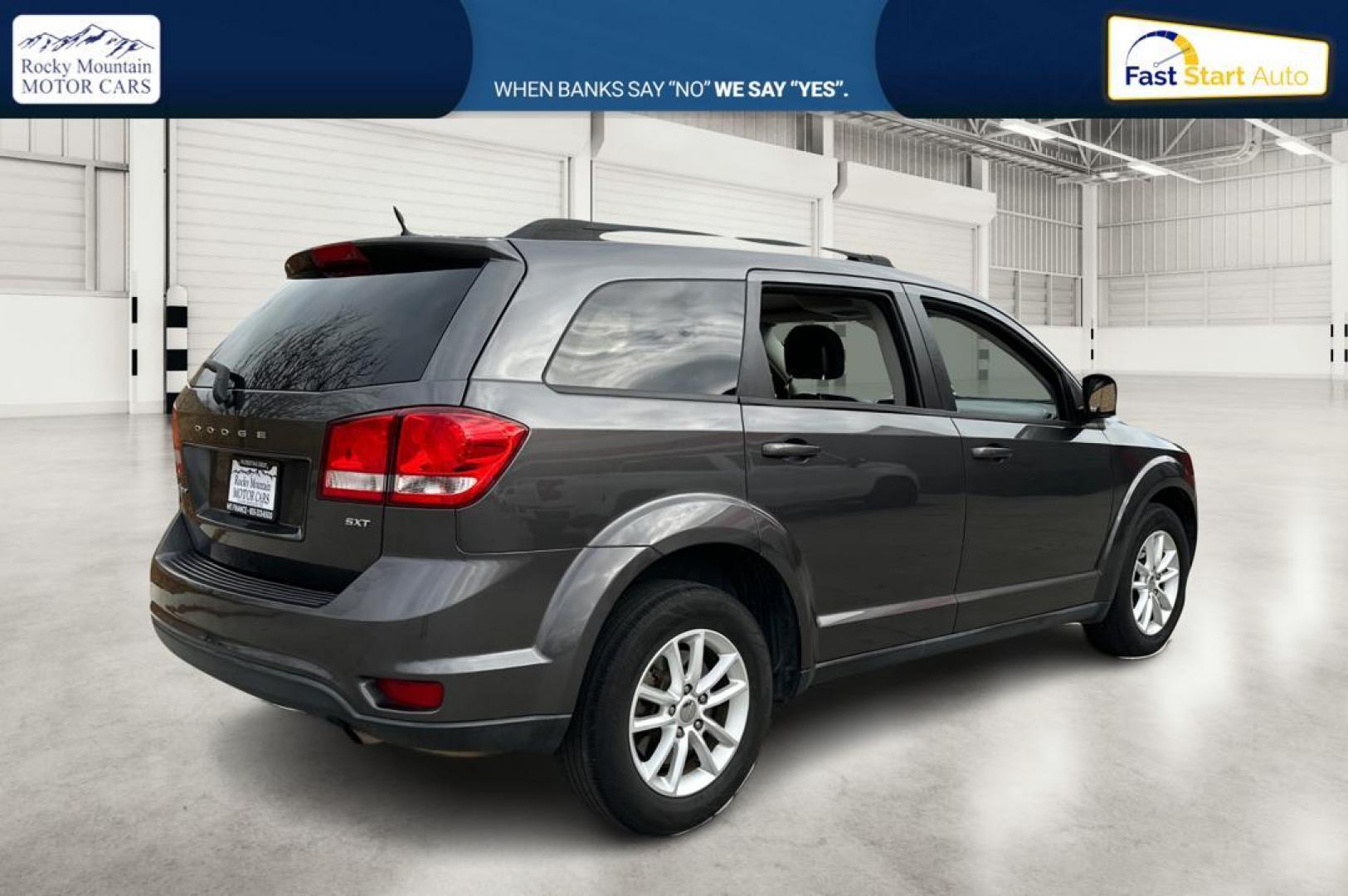 2014 Gray Dodge Journey SXT (3C4PDCBB6ET) with an 2.4L L6 DOHC 16V engine, 4-Speed Automatic transmission, located at 7755 State Street, Midvale, UT, 84047, (801) 753-9063, 40.610329, -111.892159 - Photo#2