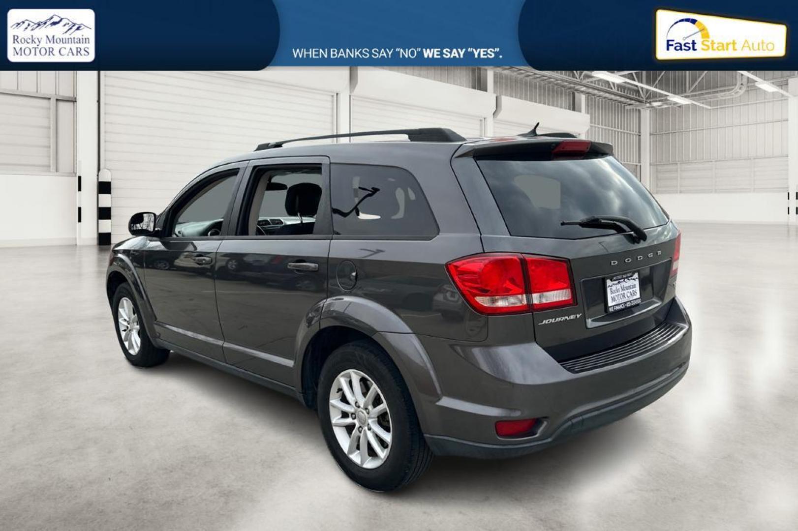 2014 Gray Dodge Journey SXT (3C4PDCBB6ET) with an 2.4L L6 DOHC 16V engine, 4-Speed Automatic transmission, located at 7755 State Street, Midvale, UT, 84047, (801) 753-9063, 40.610329, -111.892159 - Photo#5