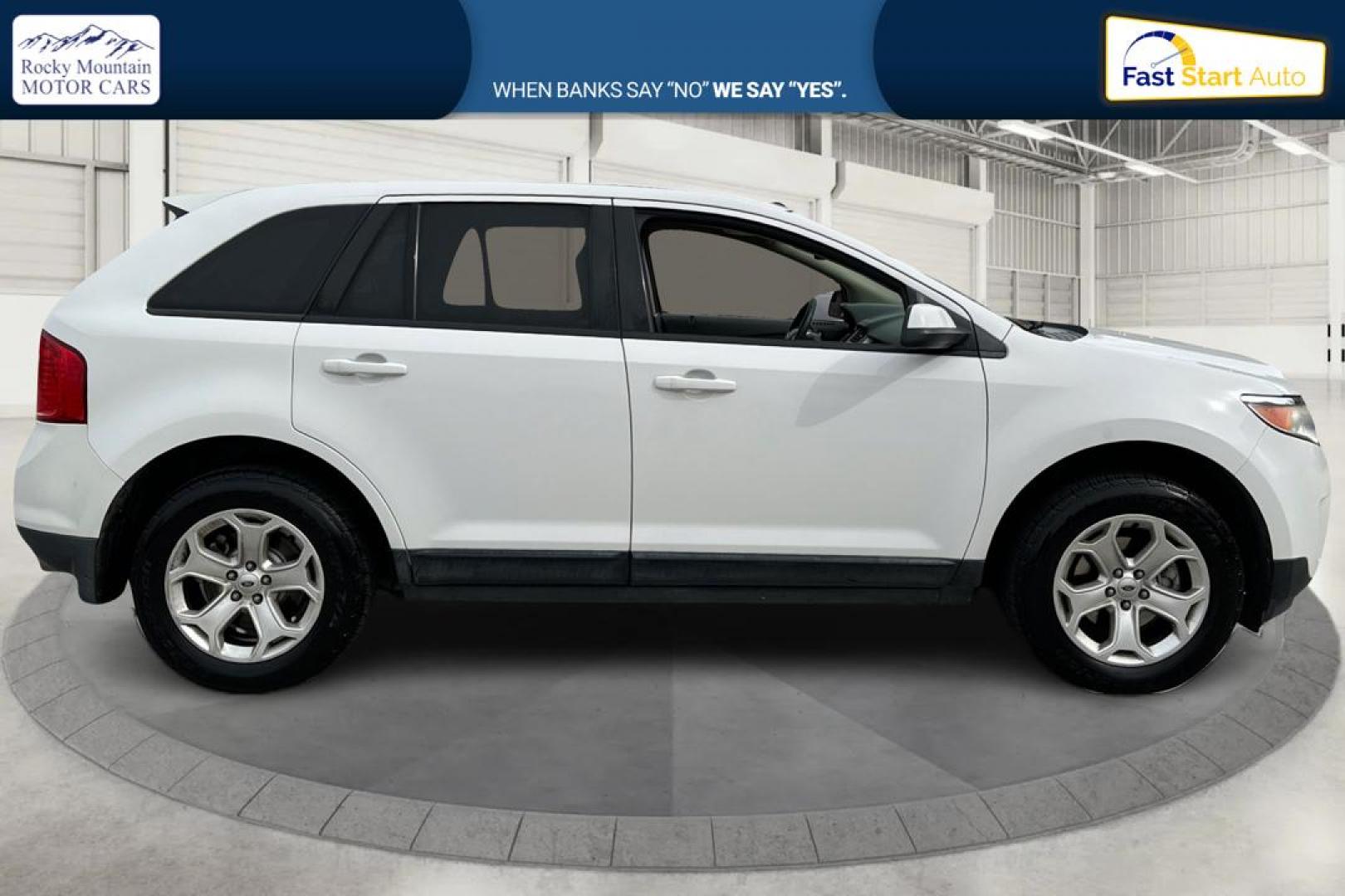 2014 White Ford Edge SEL FWD (2FMDK3JC9EB) with an 3.5L V6 DOHC 24V engine, 6-Speed Automatic transmission, located at 767 S State Road, Pleasant Grove, UT, 84062, (801) 785-1058, 40.354839, -111.736687 - Photo#1