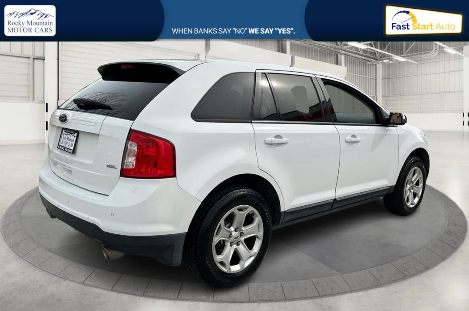 2014 White Ford Edge SEL FWD (2FMDK3JC9EB) with an 3.5L V6 DOHC 24V engine, 6-Speed Automatic transmission, located at 767 S State Road, Pleasant Grove, UT, 84062, (801) 785-1058, 40.354839, -111.736687 - Photo#2