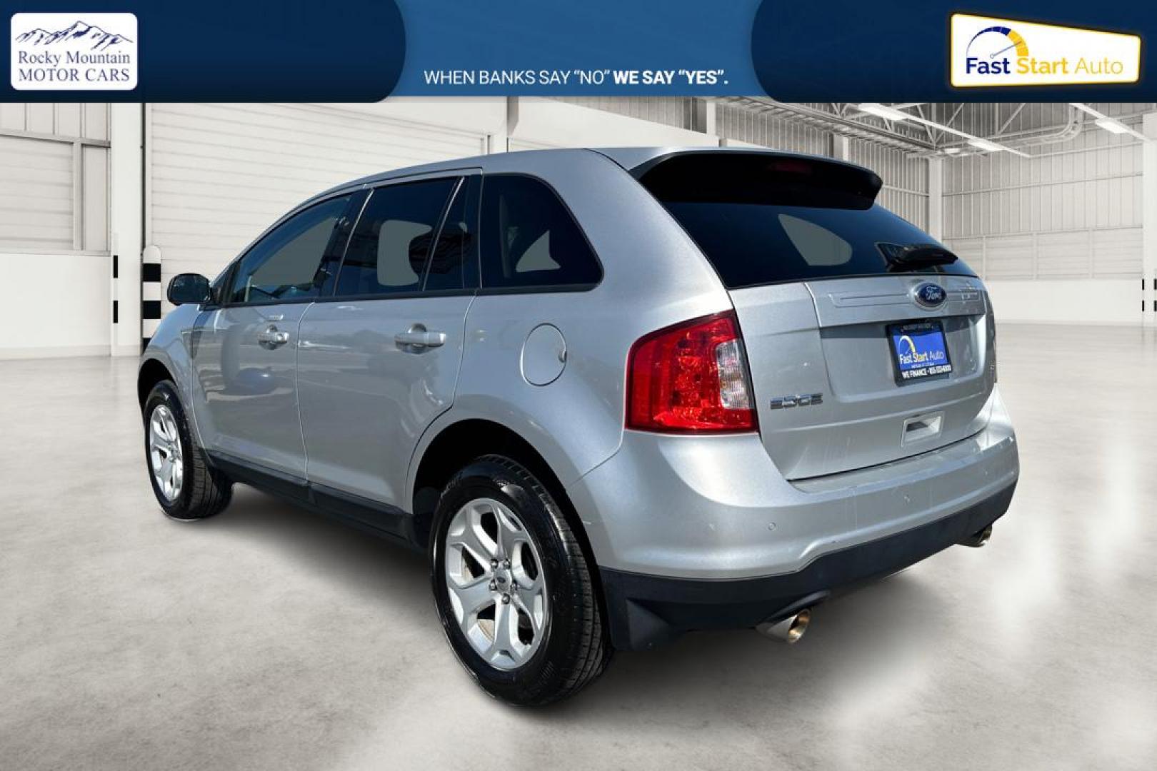 2014 Silver Ford Edge SEL FWD (2FMDK3JC9EB) with an 3.5L V6 DOHC 24V engine, 6-Speed Automatic transmission, located at 767 S State Road, Pleasant Grove, UT, 84062, (801) 785-1058, 40.354839, -111.736687 - Photo#5