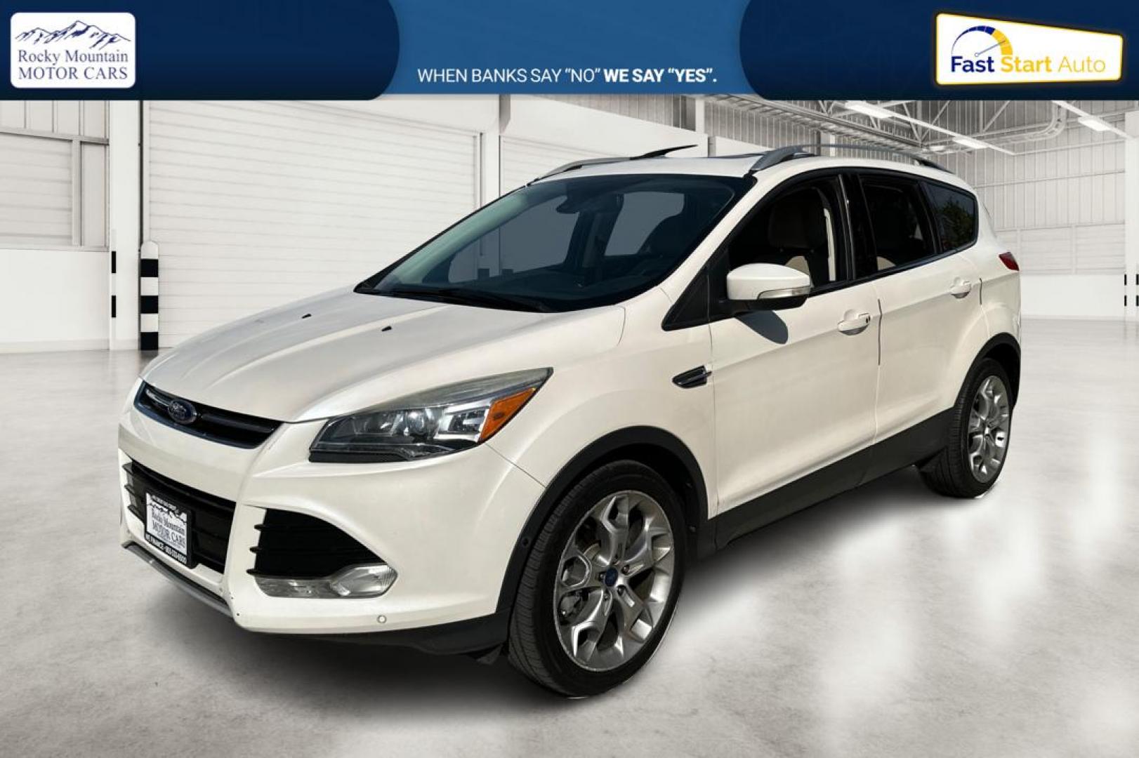 2014 White Ford Escape Titanium 4WD (1FMCU9J96EU) with an 2.0L L4 DOHC 16V engine, 6-Speed Automatic transmission, located at 767 S State Road, Pleasant Grove, UT, 84062, (801) 785-1058, 40.354839, -111.736687 - Photo#8
