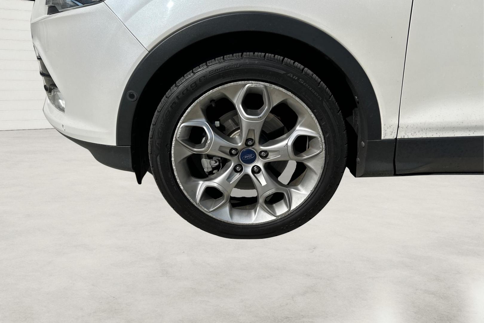 2014 White Ford Escape Titanium 4WD (1FMCU9J96EU) with an 2.0L L4 DOHC 16V engine, 6-Speed Automatic transmission, located at 767 S State Road, Pleasant Grove, UT, 84062, (801) 785-1058, 40.354839, -111.736687 - Photo#12