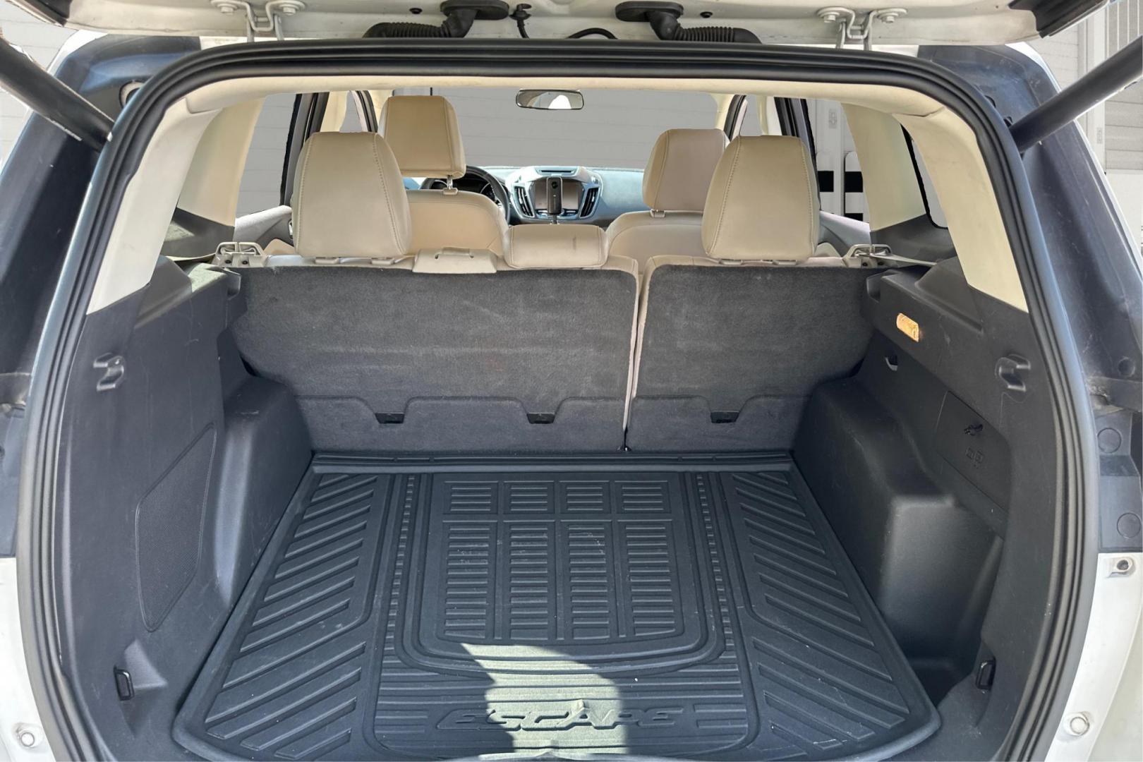 2014 White Ford Escape Titanium 4WD (1FMCU9J96EU) with an 2.0L L4 DOHC 16V engine, 6-Speed Automatic transmission, located at 767 S State Road, Pleasant Grove, UT, 84062, (801) 785-1058, 40.354839, -111.736687 - Photo#13
