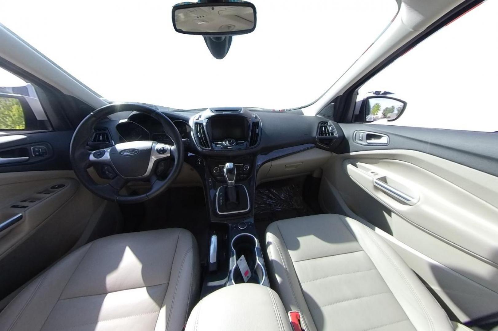2014 White Ford Escape Titanium 4WD (1FMCU9J96EU) with an 2.0L L4 DOHC 16V engine, 6-Speed Automatic transmission, located at 767 S State Road, Pleasant Grove, UT, 84062, (801) 785-1058, 40.354839, -111.736687 - Photo#14