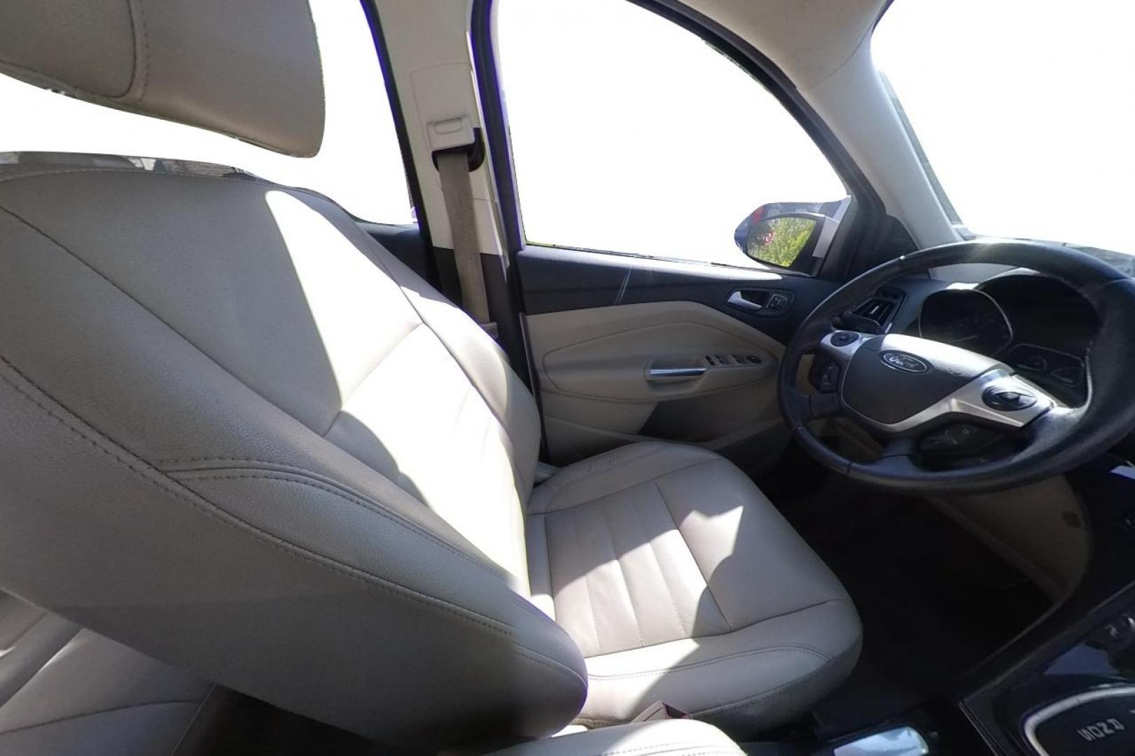 2014 White Ford Escape Titanium 4WD (1FMCU9J96EU) with an 2.0L L4 DOHC 16V engine, 6-Speed Automatic transmission, located at 767 S State Road, Pleasant Grove, UT, 84062, (801) 785-1058, 40.354839, -111.736687 - Photo#17