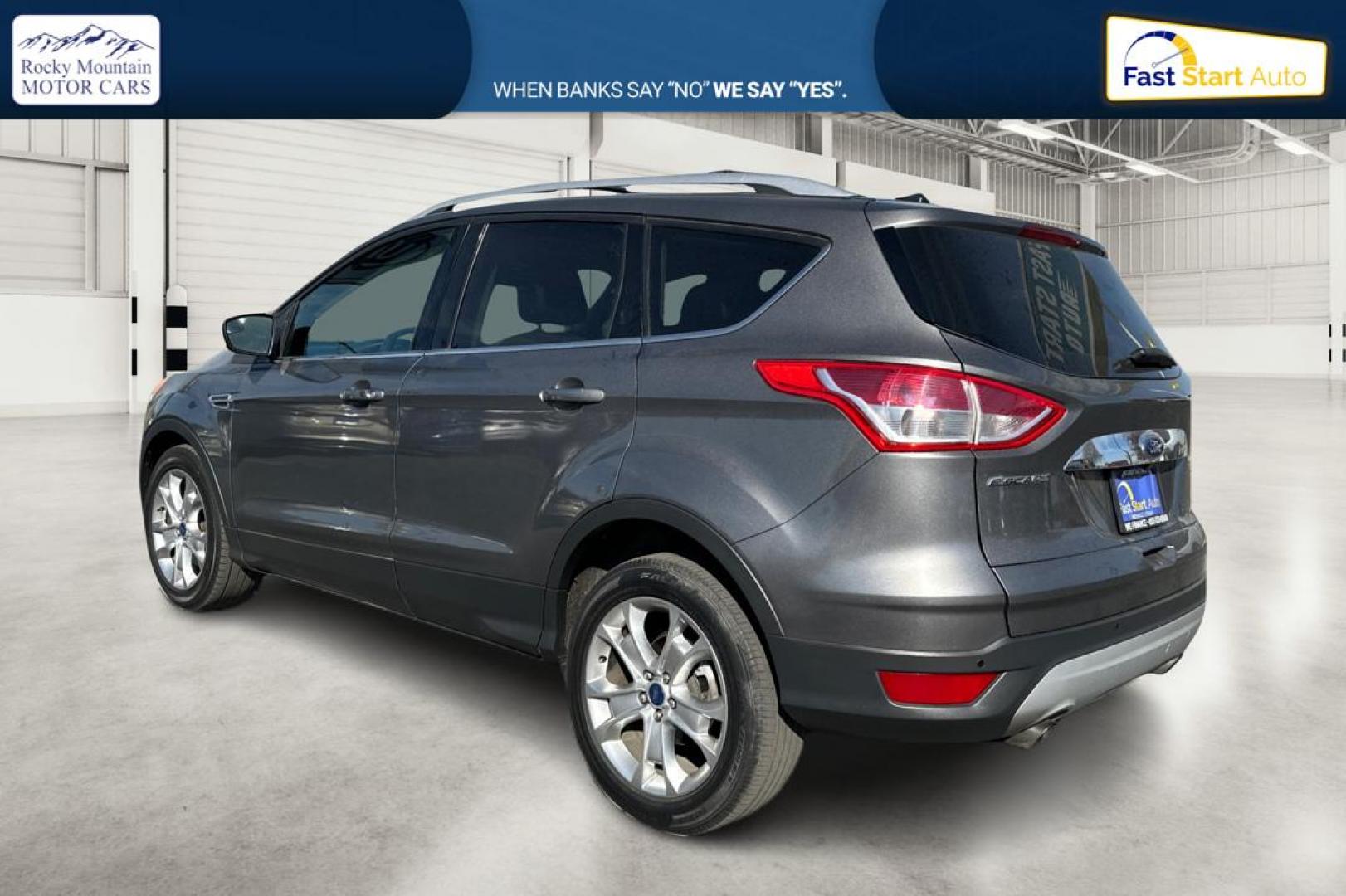2014 Gray Ford Escape Titanium FWD (1FMCU0J97EU) with an 2.0L L4 DOHC 16V engine, 6-Speed Automatic transmission, located at 7755 State Street, Midvale, UT, 84047, (801) 753-9063, 40.610329, -111.892159 - Photo#5