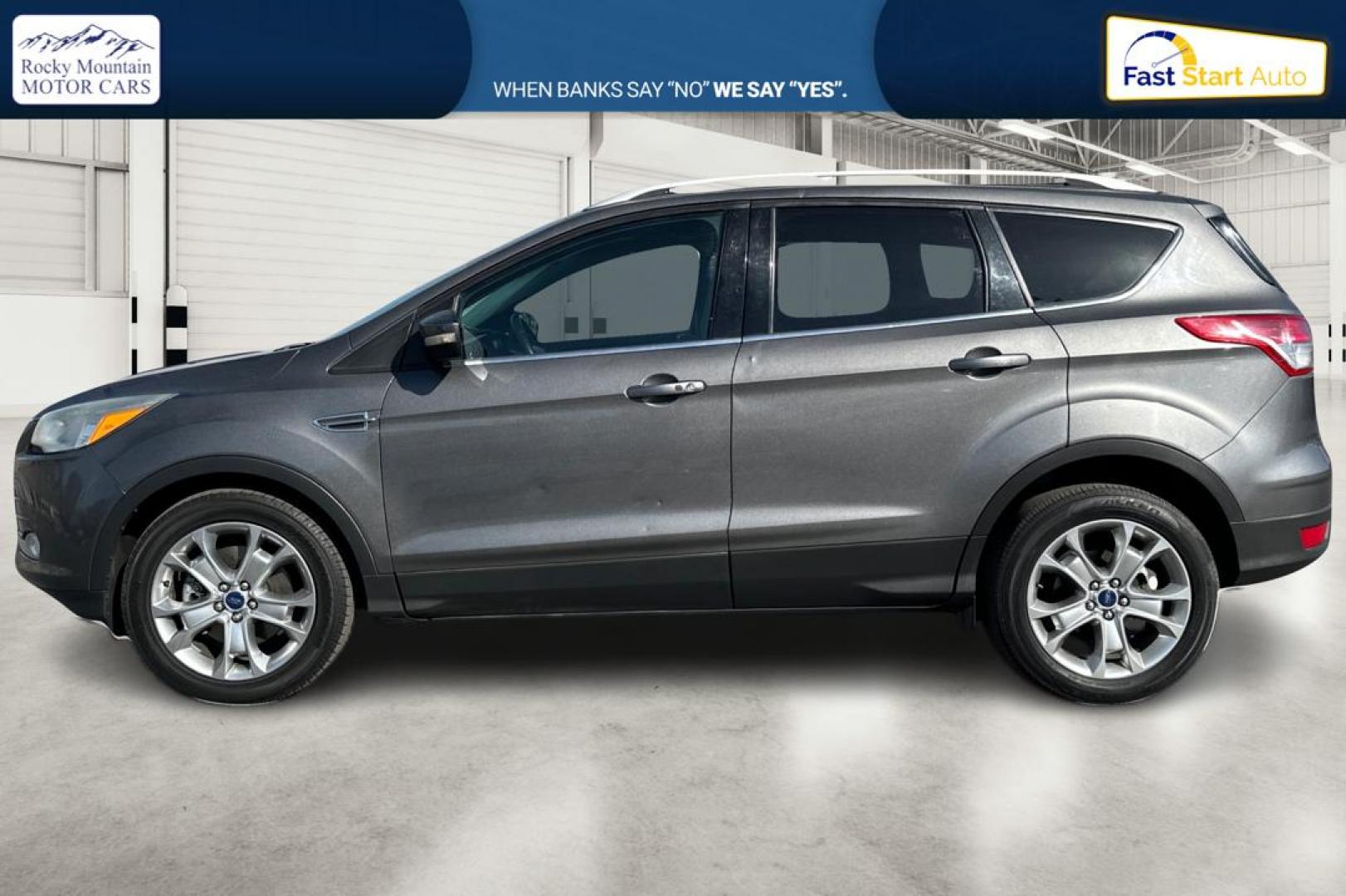 2014 Gray Ford Escape Titanium FWD (1FMCU0J97EU) with an 2.0L L4 DOHC 16V engine, 6-Speed Automatic transmission, located at 7755 State Street, Midvale, UT, 84047, (801) 753-9063, 40.610329, -111.892159 - Photo#6