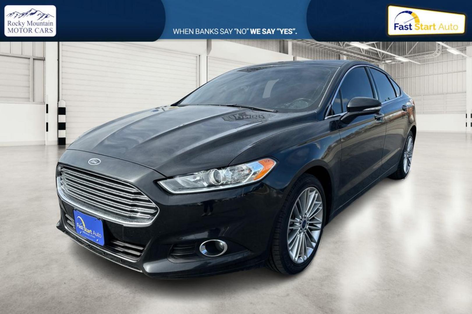 2014 Black Ford Fusion SE (3FA6P0H94ER) with an 2.0L L4 DOHC 16V engine, Automatic, 6-Spd transmission, located at 767 S State Road, Pleasant Grove, UT, 84062, (801) 785-1058, 40.354839, -111.736687 - Photo#8