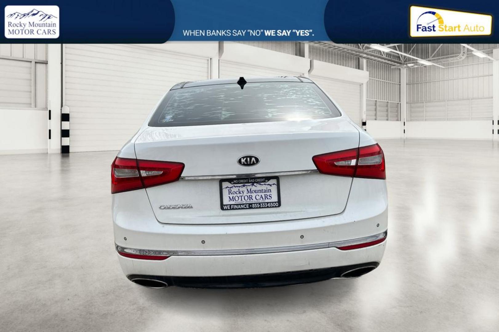 2014 White Kia Cadenza Sedan (KNALN4D78E5) with an 3.3L V6 DOHC 24V engine, 6-Speed Automatic transmission, located at 767 S State Road, Pleasant Grove, UT, 84062, (801) 785-1058, 40.354839, -111.736687 - Photo#4
