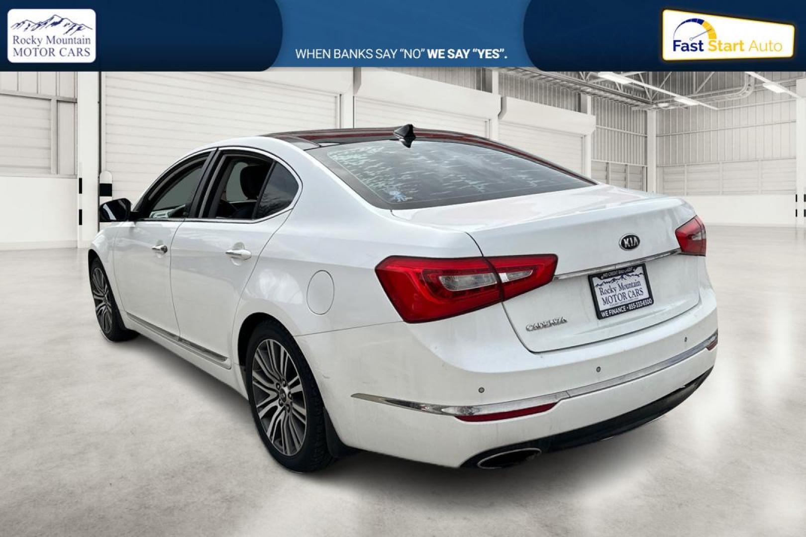 2014 White Kia Cadenza Sedan (KNALN4D78E5) with an 3.3L V6 DOHC 24V engine, 6-Speed Automatic transmission, located at 767 S State Road, Pleasant Grove, UT, 84062, (801) 785-1058, 40.354839, -111.736687 - Photo#5