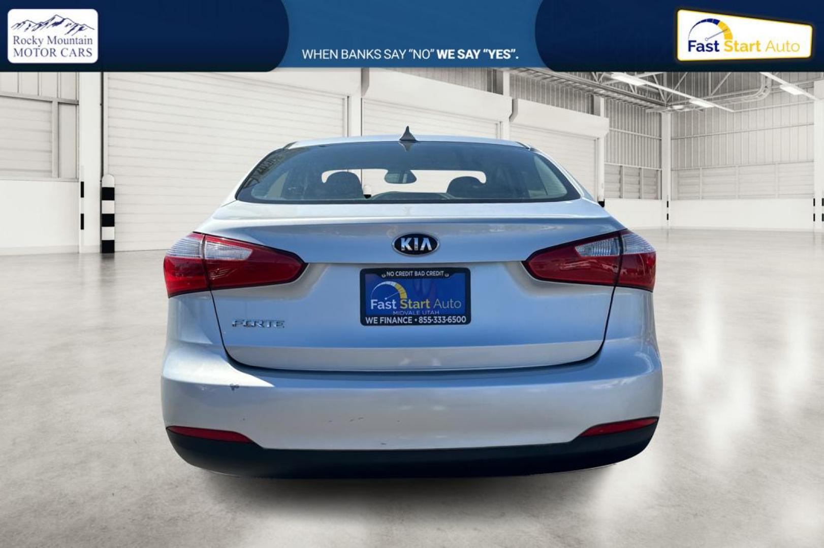 2014 Silver Kia Forte EX (KNAFX4A64E5) with an 1.8L L4 DOHC 16V engine, 6-Speed Automatic transmission, located at 7755 State Street, Midvale, UT, 84047, (801) 753-9063, 40.610329, -111.892159 - Photo#4