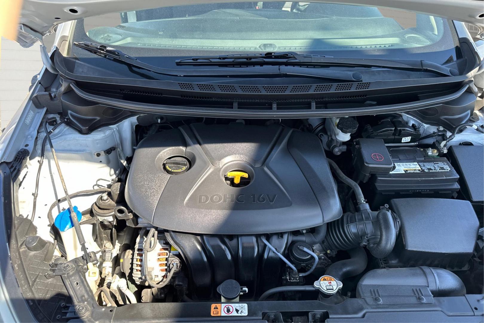 2014 Silver Kia Forte EX (KNAFX4A64E5) with an 1.8L L4 DOHC 16V engine, 6-Speed Automatic transmission, located at 7755 State Street, Midvale, UT, 84047, (801) 753-9063, 40.610329, -111.892159 - Photo#10